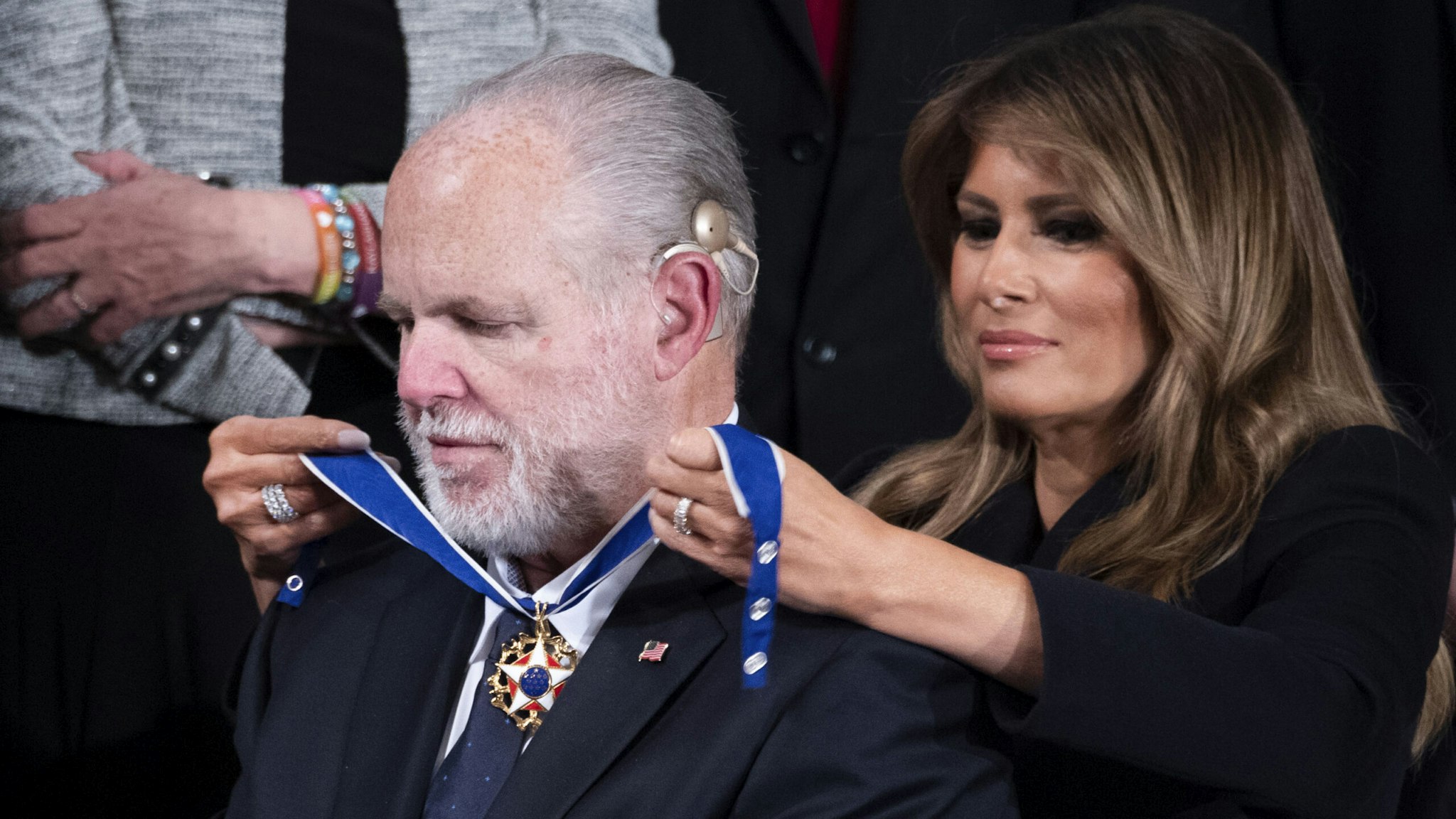 UNITED STATES - FEBRUARY 04: First Lady Melania Trump awards Rush Limbaugh the Presidential Medal of Freedom during President Donald Trumps State of the Union address in the House Chamber on Tuesday, February 4, 2020.