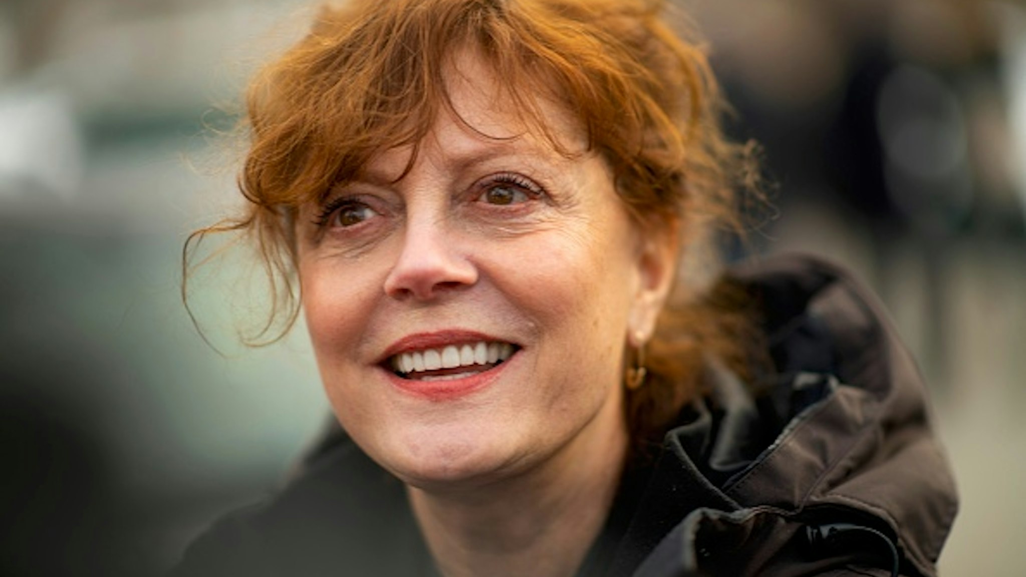 WATERLOO, IA - FEBRUARY 1: Actress Susan Sarandon, a supporter of Democratic Presidential candidate Bernie Sanders, greets local campaign volunteers after speaking during a field office event on February 1, 2020 in Waterloo, Iowa. On the penultimate day of campaign before the Iowa Caucus, Democratic Presidential candidates and their supporters are traversing the state to greet prospective voters.