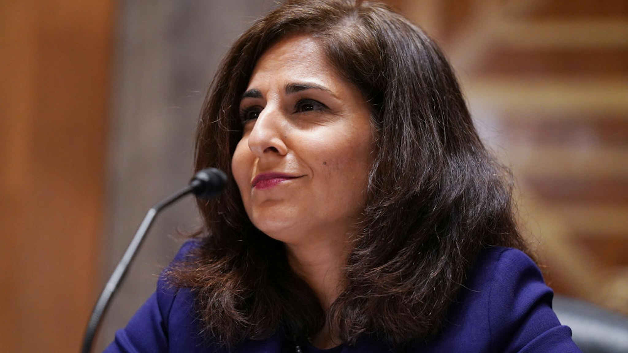 Neera Tanden, director of the Office and Management and Budget (OMB) nominee for U.S. President Joe Biden, speaks during a Senate Homeland Security and Governmental Affairs Committee confirmation hearing in Washington, D.C., U.S., on Tuesday, Feb. 9, 2021. Tanden, who pledged to work with both parties after drawing sharp criticism from Republicans for sniping at them on social media, worked on the Affordable Care Act during the Obama years and was an aide to Hillary Clinton from her time as first lady.