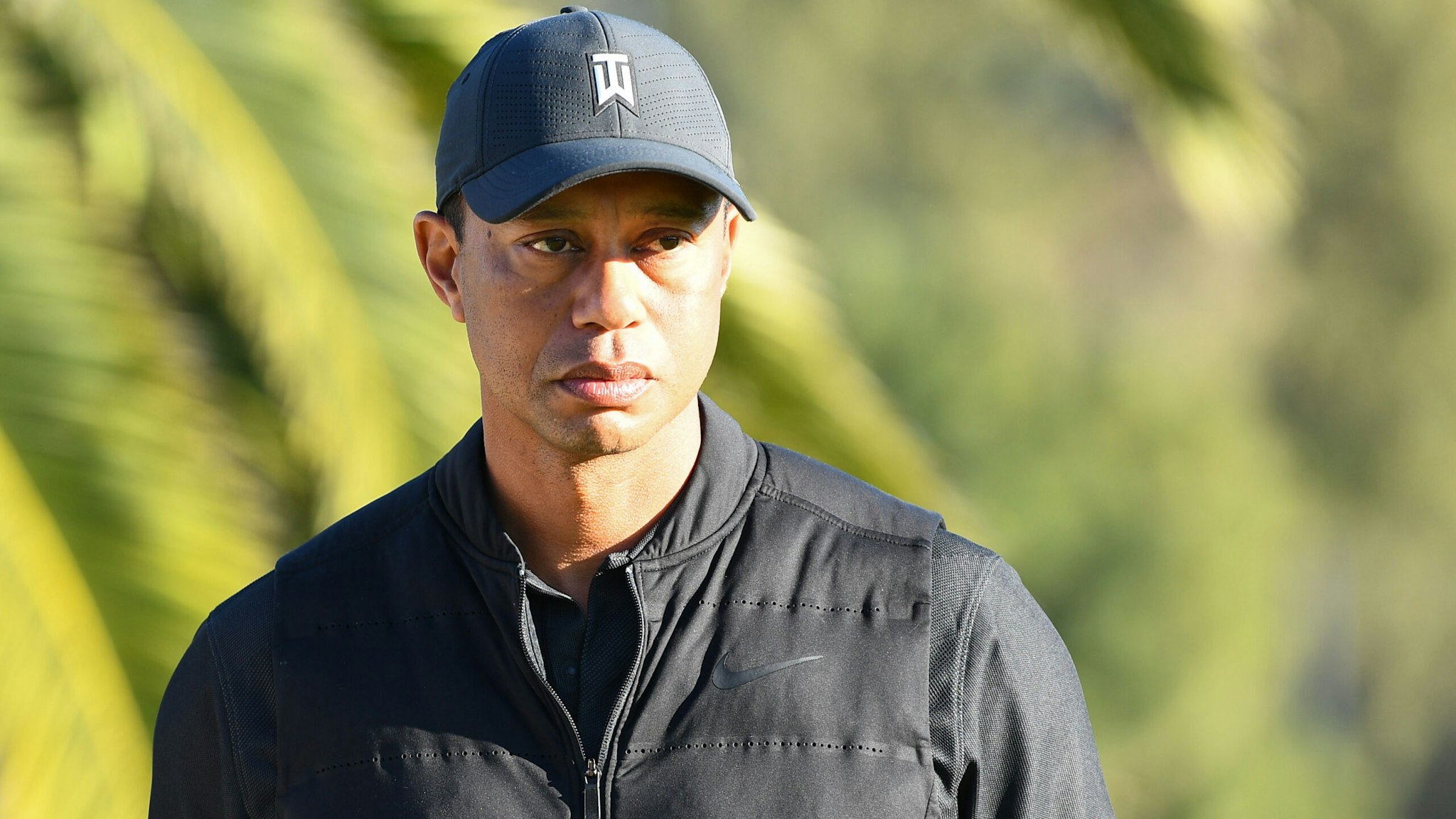 PACIFIC PALISADES, CA - FEBRUARY 21: Tiger Woods looks on from the 18th hole during the final round of The Genesis Invitational golf tournament at the Riviera Country Club in Pacific Palisades, CA on February 21, 2021. The tournament was played without fans due to the COVID-19 pandemi