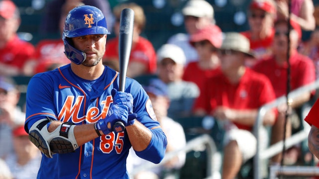 JUPITER, FL - MARCH 05: Tim Tebow #85 of the New York Mets looks on before stepping to the plate to bat against the St Louis Cardinals during a Grapefruit League spring training game at Roger Dean Stadium on March 5, 2020 in Jupiter, Florida. The game ended in a 7-7 tie. (Photo by Joe Robbins/Getty Images)