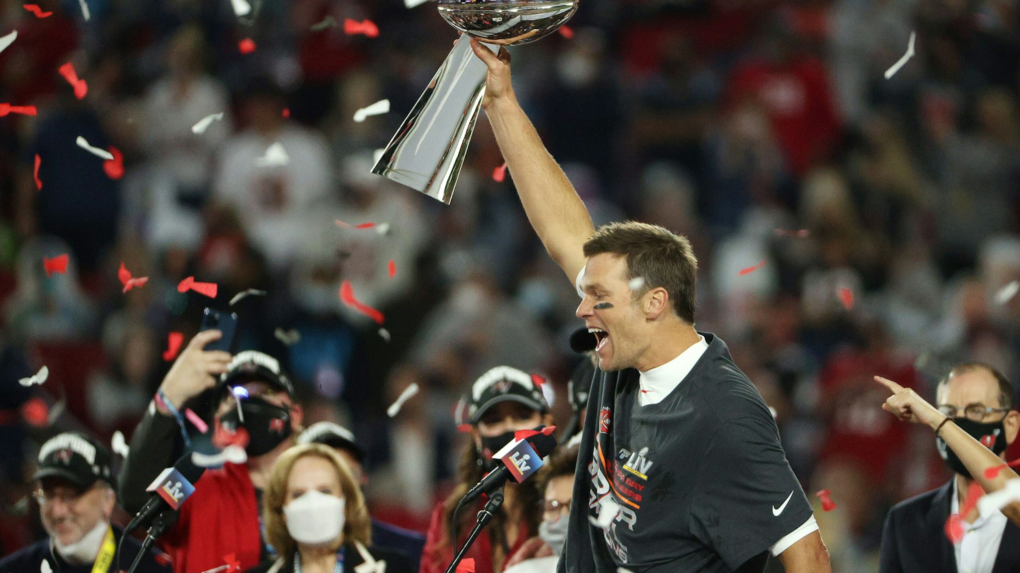 TAMPA, FLORIDA - FEBRUARY 07: Tom Brady #12 of the Tampa Bay Buccaneers celebrates with the Lombardi Trophy after defeating the Kansas City Chiefs in Super Bowl LV at Raymond James Stadium on February 07, 2021 in Tampa, Florida. The Buccaneers defeated the Chiefs 31-9.
