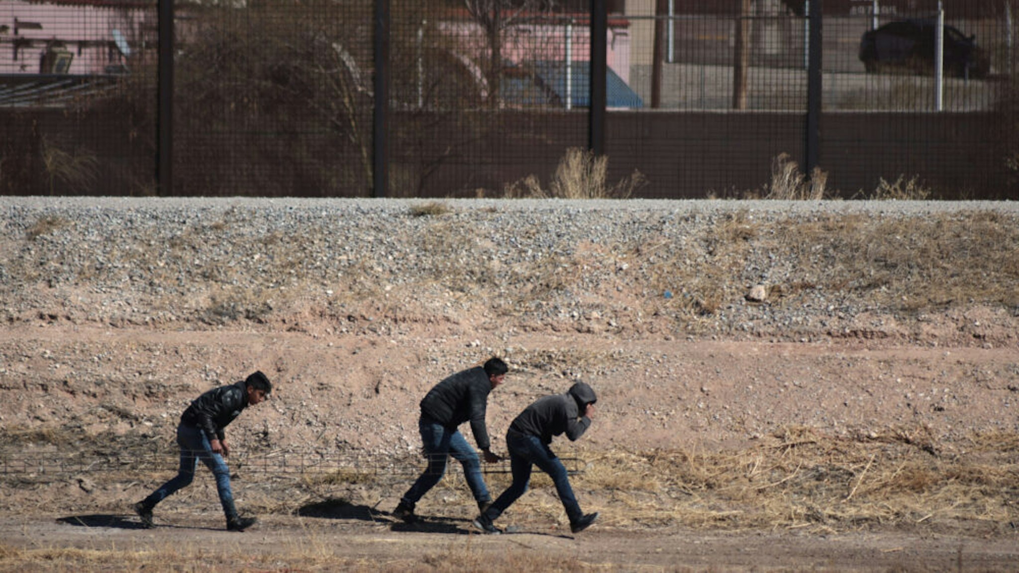 Three migrants tried to trick the border patrol to cross the border and reach the United States, but were detained by the agents in Juarez Chihuahua, Mexico, on 22 January 2021.