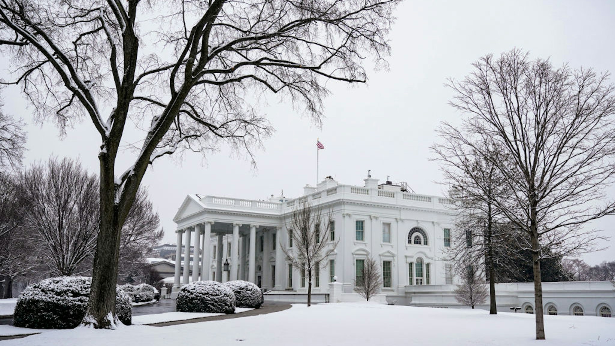 WASHINGTON, DC - JANUARY 31: The White House ground are covered in snow during a snow storm on January 31, 2021 in Washington, DC. Washington is expecting 3 to 5 inches of snow during the first major snow storm of the year.