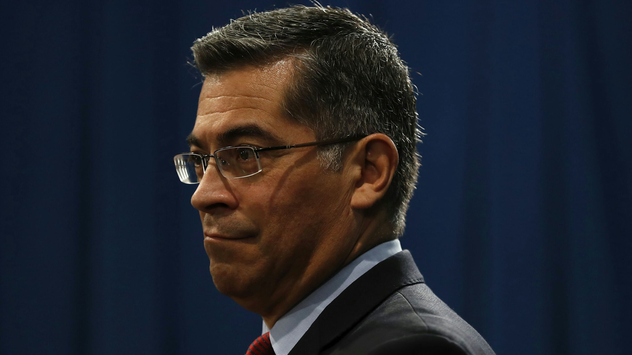 SACRAMENTO, CA - MARCH 07: California Attorney General Xavier Becerra reacts during a press conference at the California State Capitol on March 7, 2018 in Sacramento, California. The press conference came in response to an earlier by U.S. Attorney General Jeff Sessions at a nearby hotel and the Justice Department's decision to sue the State of California over its controversial sanctuary policies for undocumented immigrants.