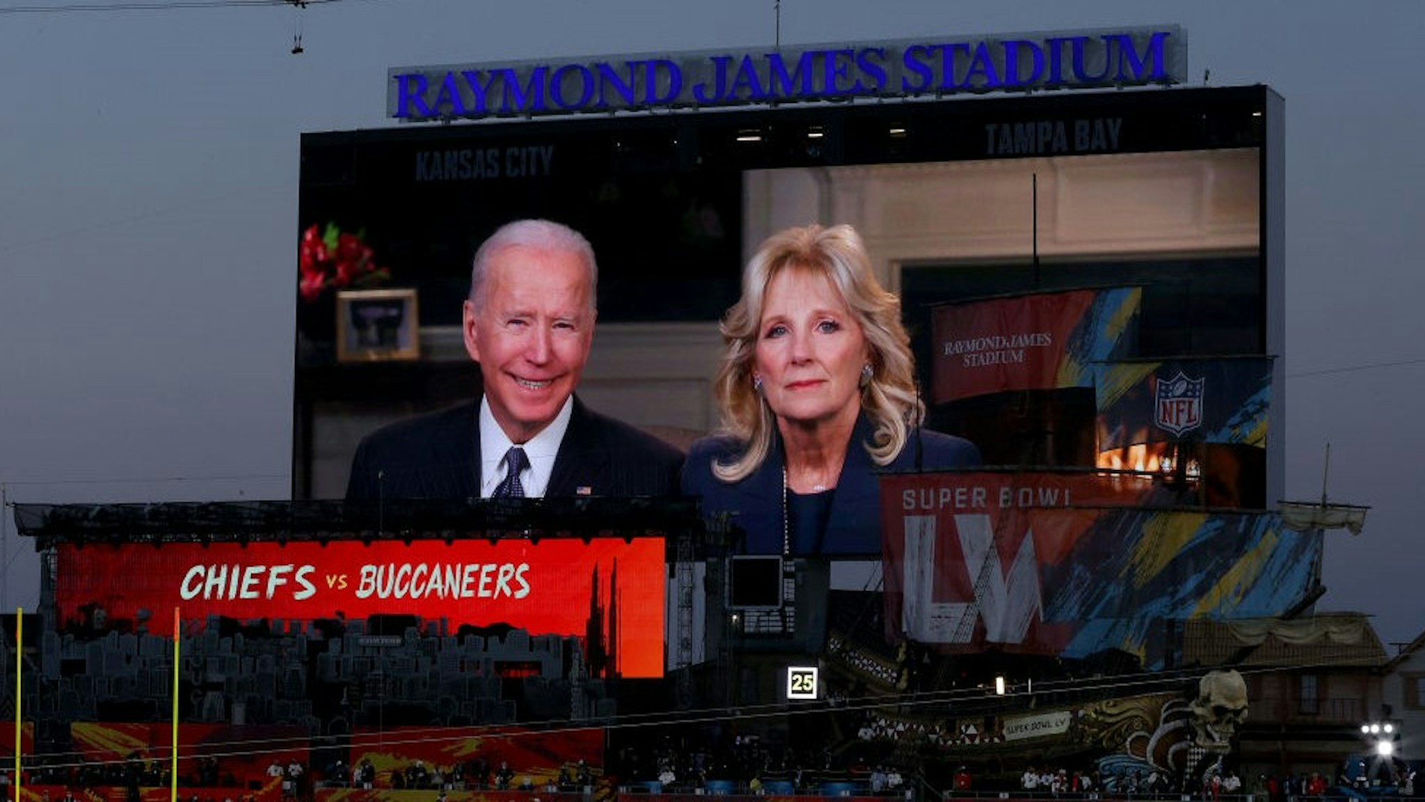 TAMPA, FLORIDA - FEBRUARY 07: U.S. president Joe Biden and First Lady Dr. Jill Biden deliver an address in Super Bowl LV at Raymond James Stadium on February 07, 2021 in Tampa, Florida. (Photo by
