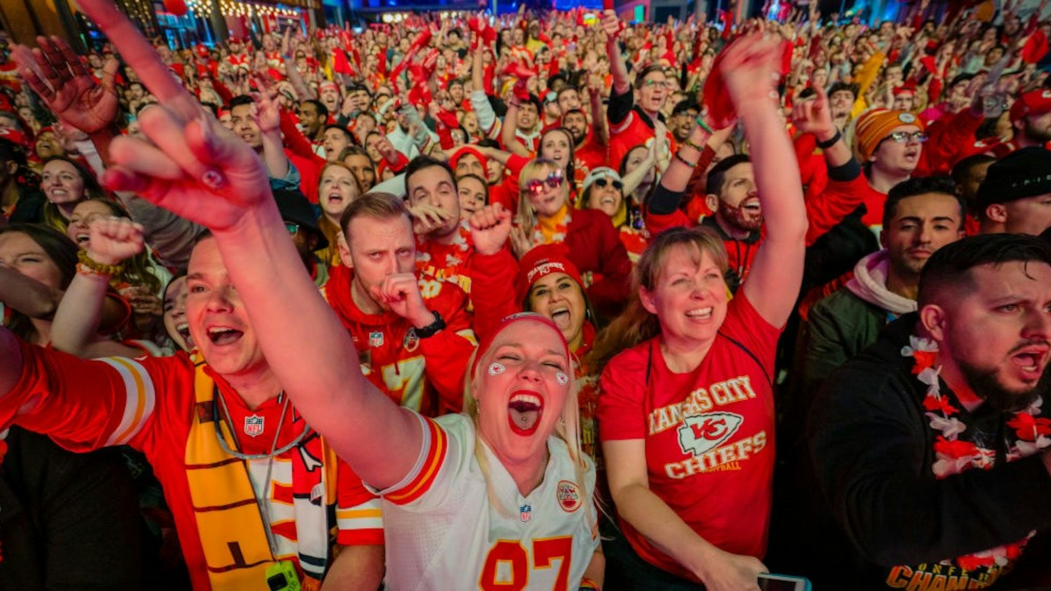 KANSAS CITY, MO - FEBRUARY 02: Fans cheer on the Chiefs at the Power and Light District as the Kansas City Chiefs play the San Francisco 49ers in the Super Bowl on February 2, 2020 in Kansas City, Kansas. (Photo by