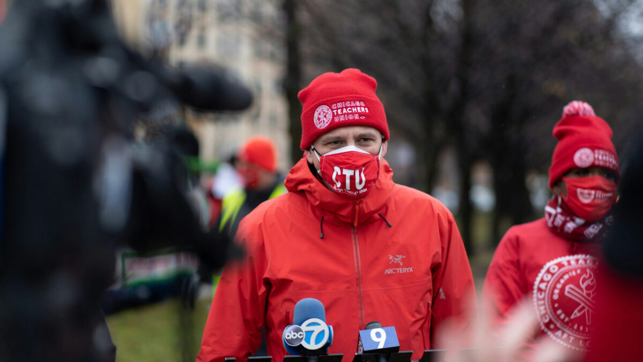 Chicago Teachers Union President Jesse Sharkey speaks ahead of a car caravan where teachers and supporters gathered to demand a safe and equitable return to in-person learning during the COVID-19 pandemic in Chicago, IL on December 12, 2020.