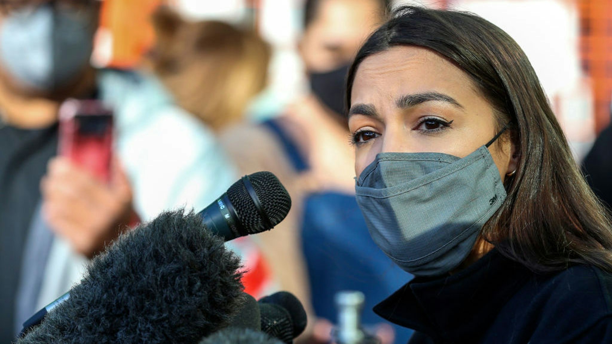 Congresswoman Alexandria Ocasio-Cortez speaks to the media at the Houston Food Bank on February 20, 2021 in Houston, Texas. - The lawmakers address the weather disaster in Texas and helped distribute food at the food bank. (Photo by Thomas Shea / AFP) (Photo by THOMAS SHEA/AFP via Getty Images)
