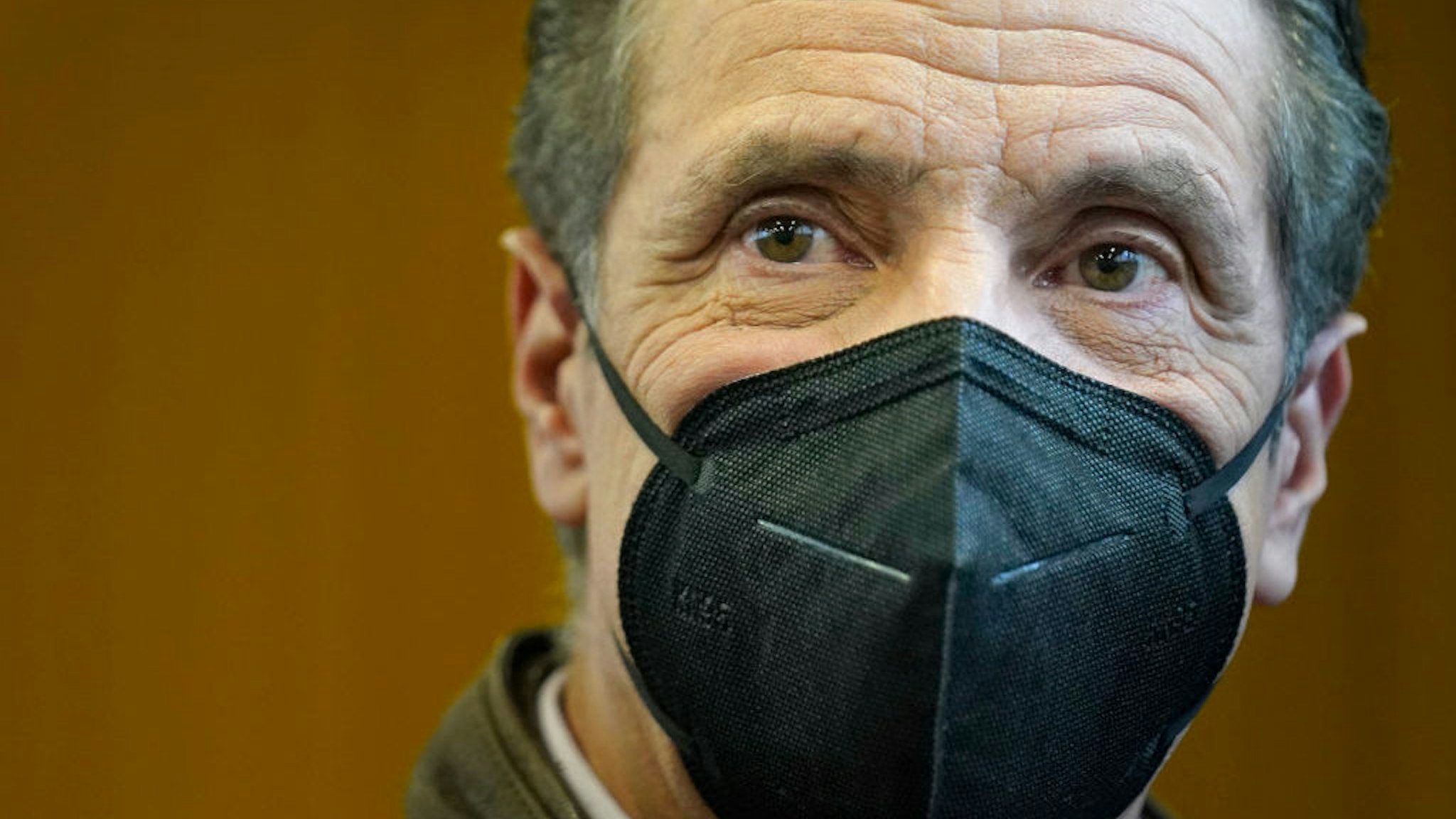 New York Governor Andrew Cuomo walks through a vaccination site after speaking in the Brooklyn borough of New York, on February 22, 2021. (Photo by Seth WENIG / POOL / AFP) (Photo by SETH WENIG/POOL/AFP via Getty Images)