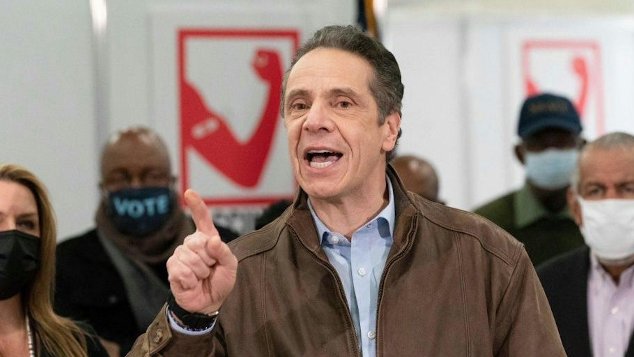 Governor Andrew Cuomo speaks during a visit to a new Covid-19 vaccination site, March 15, 2021, at the State University of New York in Old Westbury. The site is scheduled to open on Friday. (Photo by Mark Lennihan / POOL / AFP)