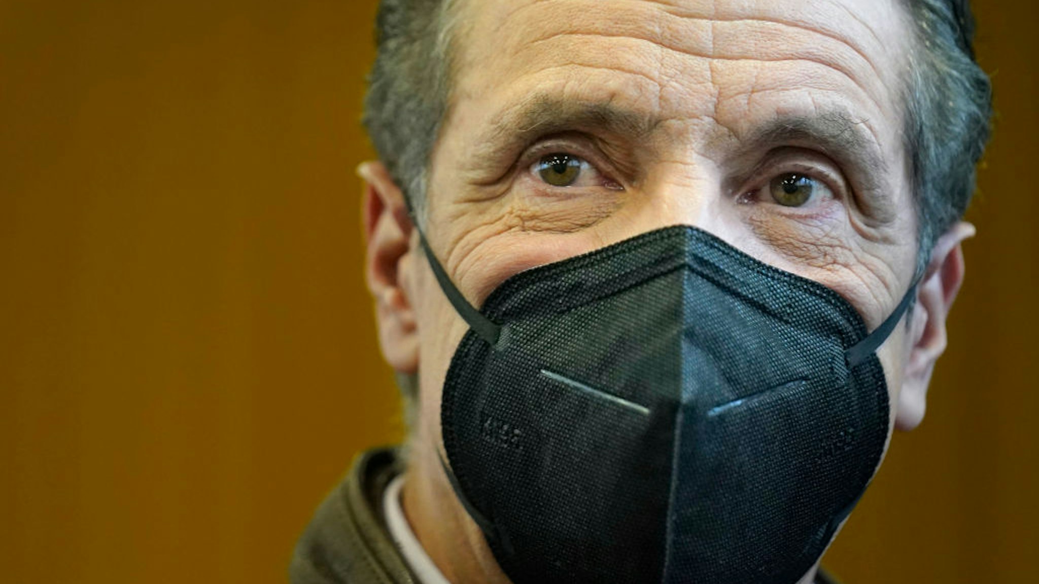 New York Governor Andrew Cuomo walks through a vaccination site after speaking in the Brooklyn borough of New York, on February 22, 2021.