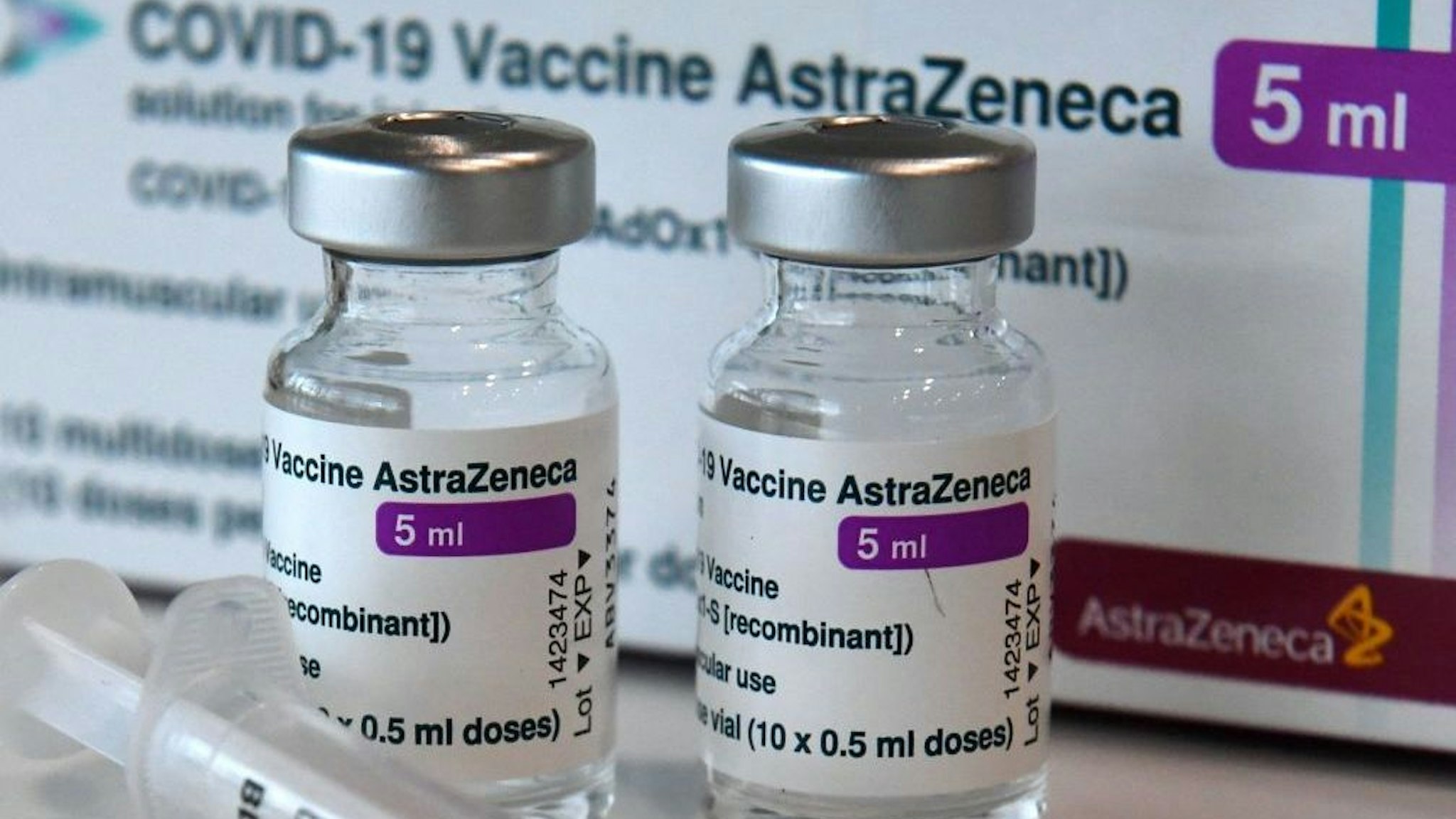 Vials with the AstraZenaca COVID-19 vaccine against the novel coronavirus are pictured at the vaccination center in Nuremberg, southern Germany, on March 18, 2021. - Germany on March 15 halted the use of AstraZeneca's coronavirus vaccine after reported blood clotting incidents in Europe, saying that a closer look was necessary.