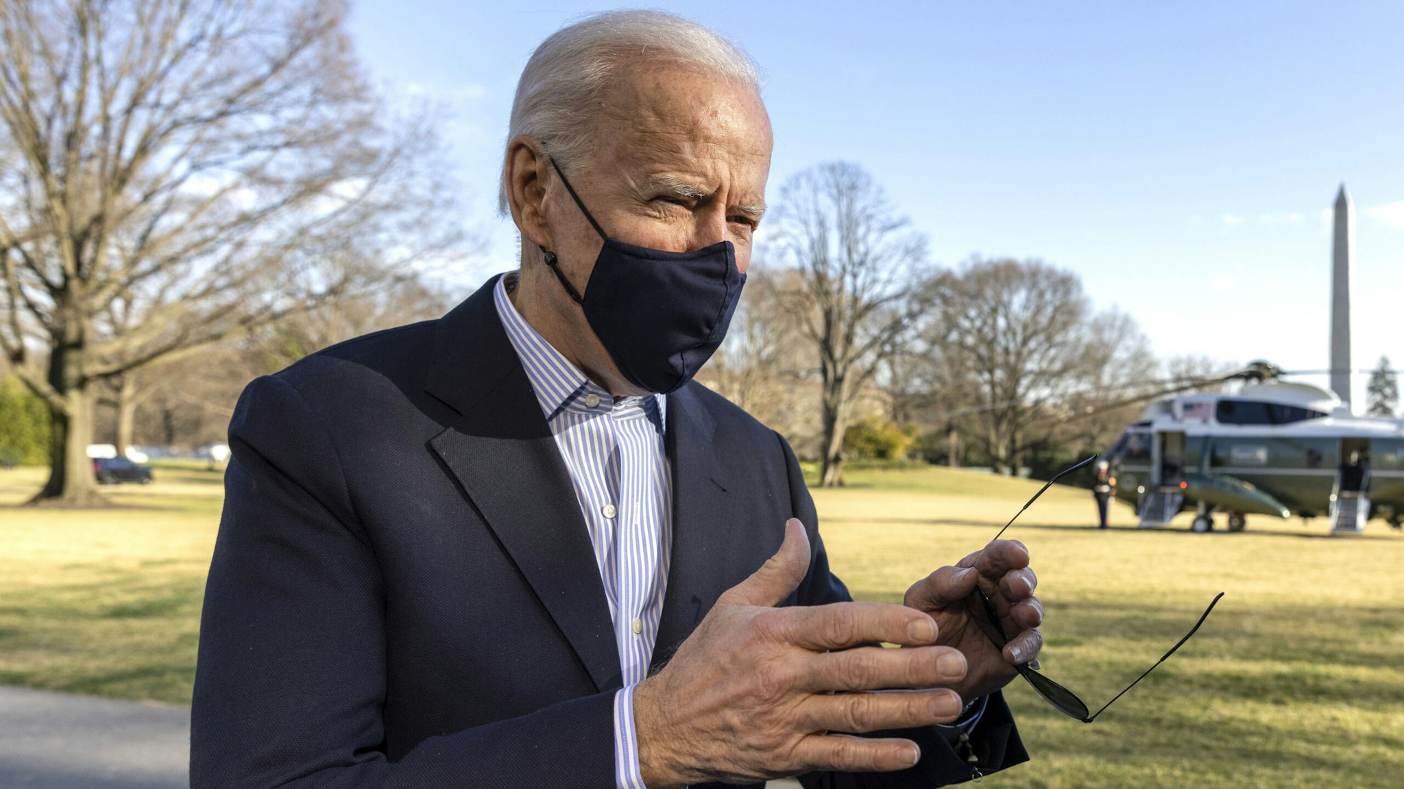 WASHINGTON, DC - MARCH 21: U.S. President Joe Biden stops to talk to reporters on the South Lawn of the White House on March 21, 2021 in Washington, DC. The President and first lady spent the weekend at Camp David with family.