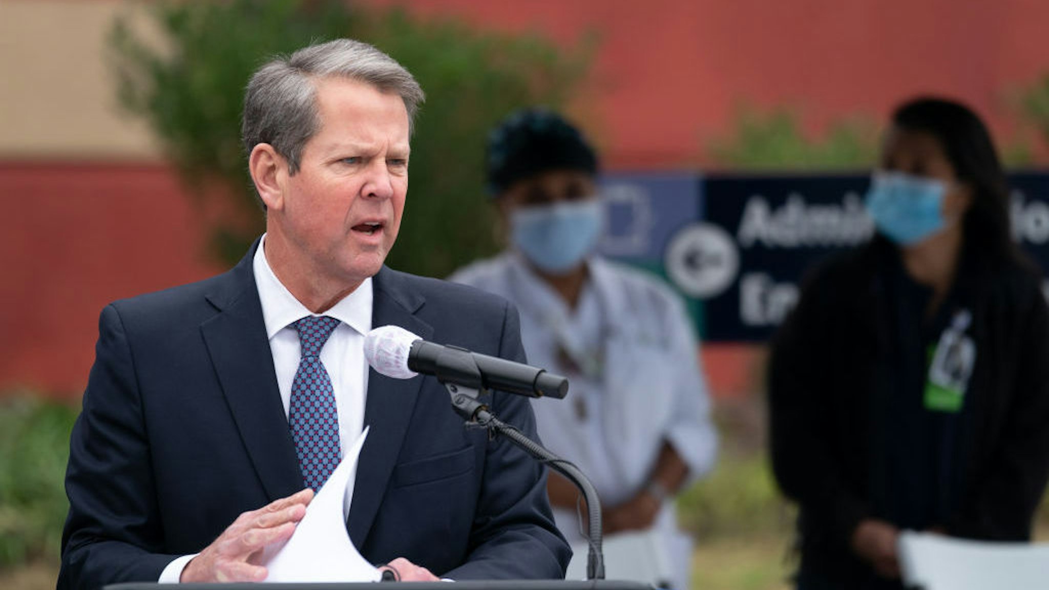 SAVANNAH, GA - DECEMBER 15: Georgia Gov. Brian Kemp speaks to the media before health care workers receive the Pfizer-BioNTech COVID-19 vaccine outside of the Chatham County Health Department on December 15, 2020 in Savannah, Georgia. Kemp was on hand to witness initial administering of vaccines in the state. (Photo by Sean Rayford/Getty Images)