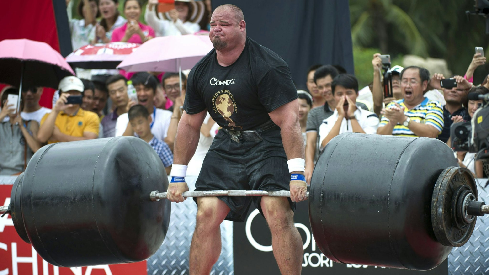 HAINAN ISLAND, CHINA - AUGUST 24: Brian Shaw of USA competes at the Deadlift for Max event during the World's Strongest Man competition at Yalong Bay Cultural Square on August 24, 2013 in Hainan Island, China.