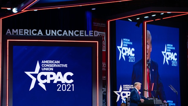Former U.S. President Donald Trump speaks during the Conservative Political Action Conference (CPAC) in Orlando, Florida, U.S., on Sunday, Feb. 28, 2021. Trump rejected the idea of starting a third political party and instead teased the idea of a 2024 run in a speech Sunday at a conservative conference.