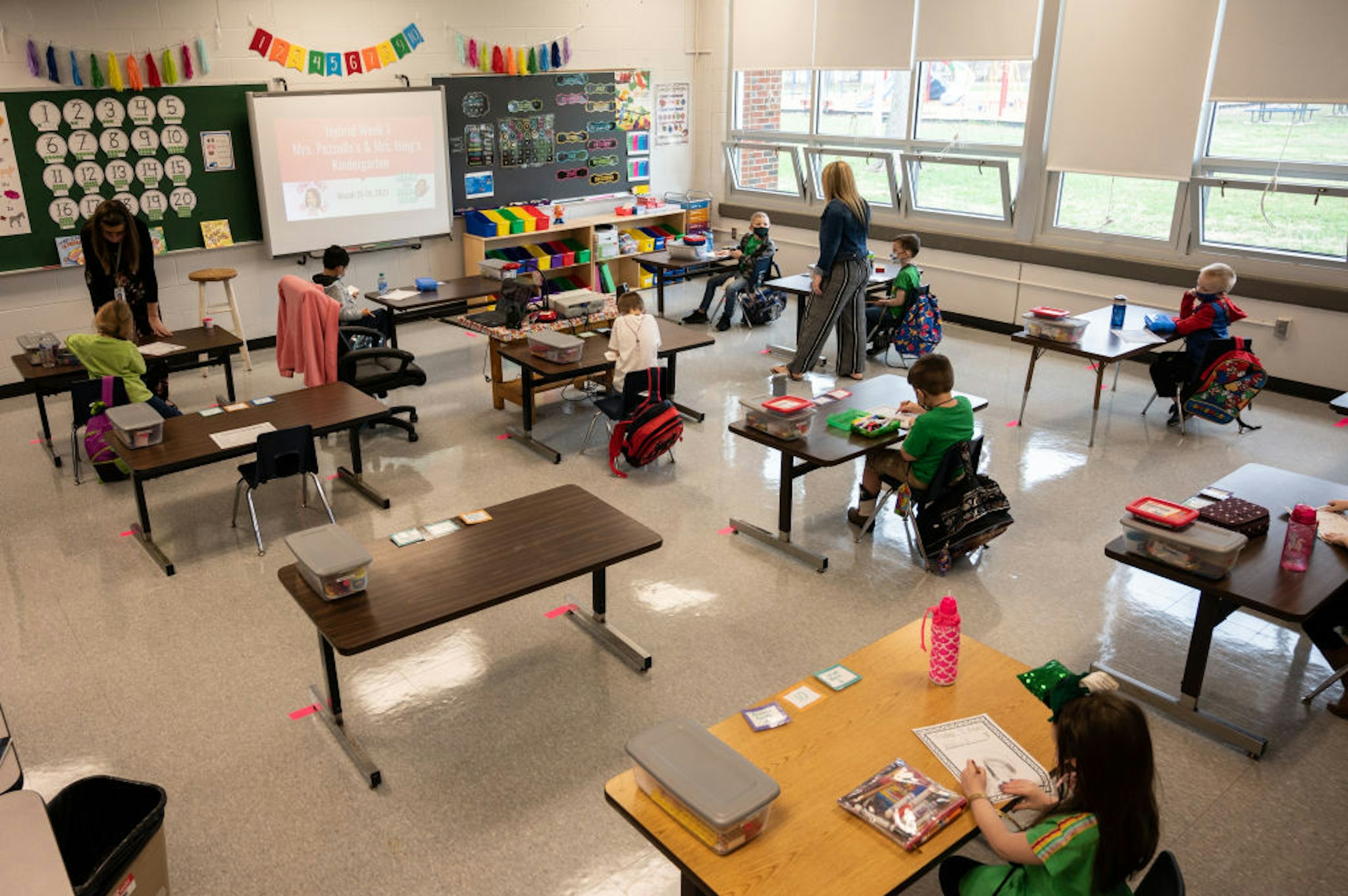 LOUISVILLE, KY - MARCH 17: Students and teachers participate in a socially distanced classroom session at Medora Elementary School on March 17, 2021 in Louisville, Kentucky. Today marks the reopening of Jefferson County Public Schools for in-person learning with new COVID-19 procedures in place.