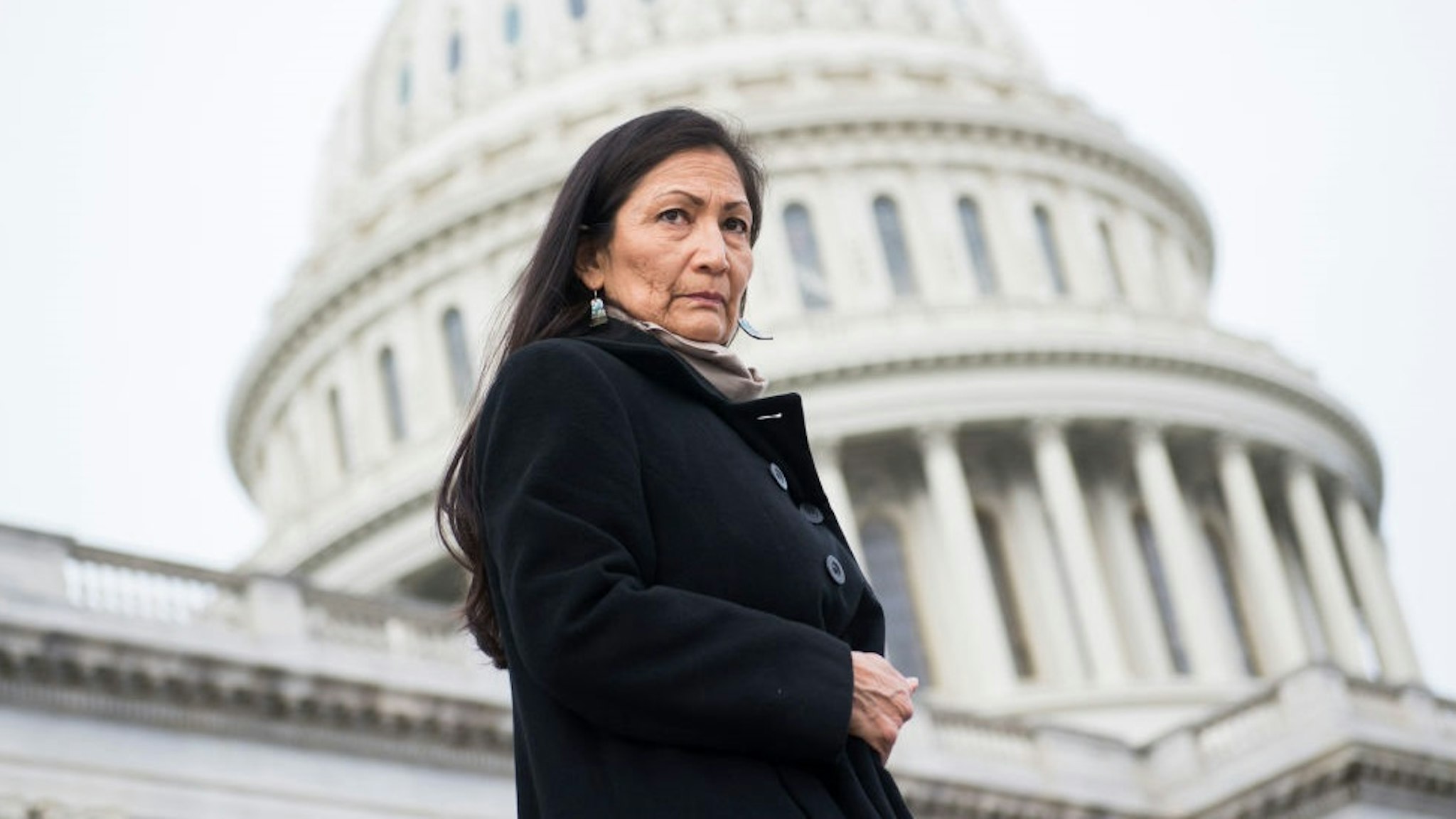 UNITED STATES - JANUARY 04: Rep. Deb Haaland, D-N.M., makes her way to a group photo with Democratic women members of the House on the East Front of the Capitol on January 4, 2019.