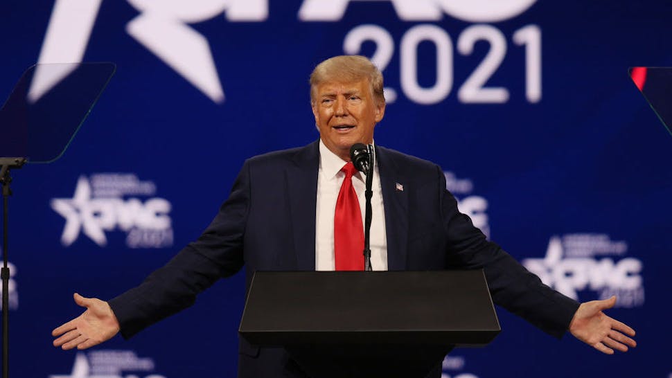 Donald Trump ORLANDO, FLORIDA - FEBRUARY 28: Former U.S. President Donald Trump addresses the Conservative Political Action Conference (CPAC) held in the Hyatt Regency on February 28, 2021 in Orlando, Florida. Begun in 1974, CPAC brings together conservative organizations, activists, and world leaders to discuss issues important to them. (Photo by Joe Raedle/Getty Images)