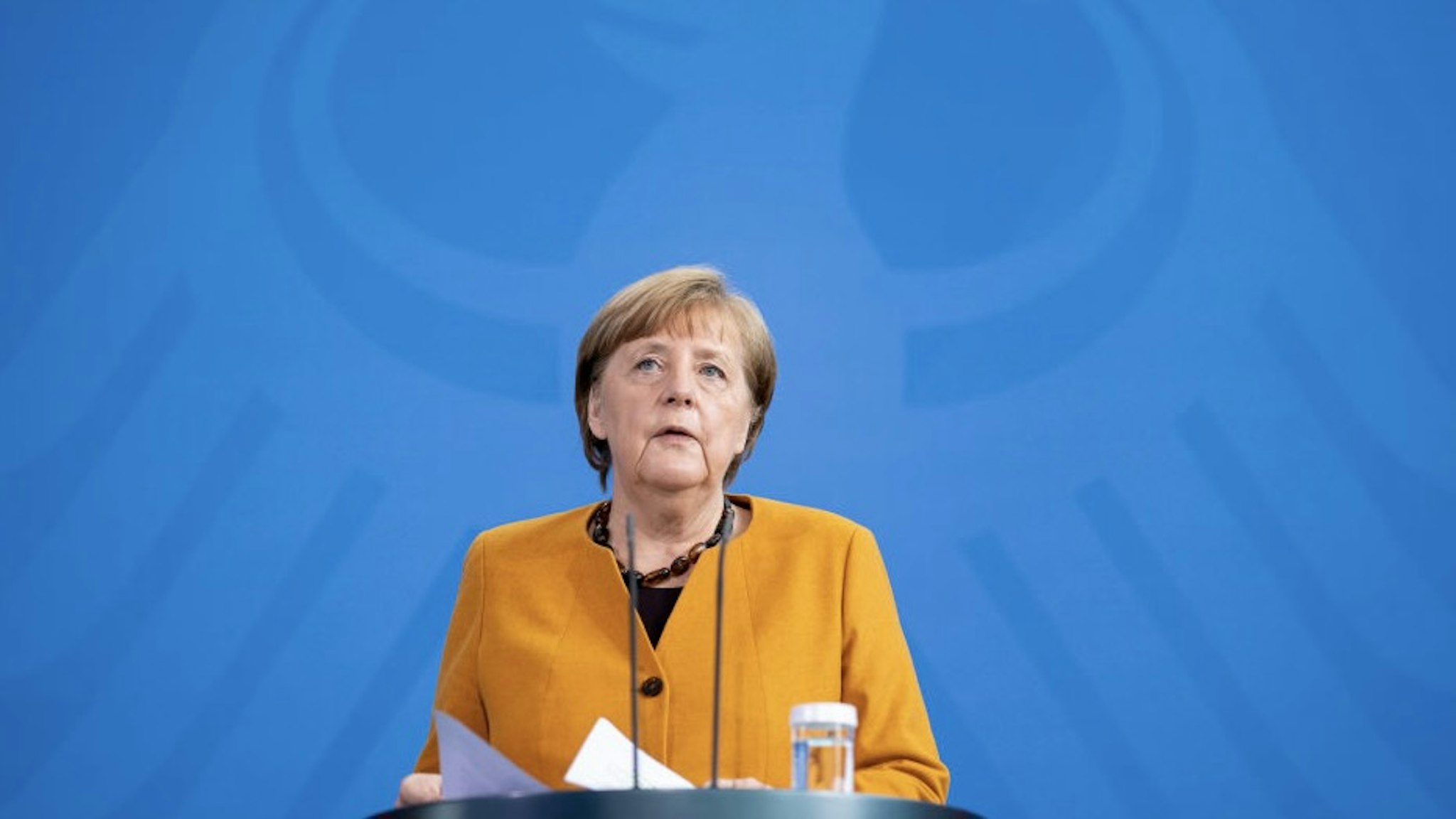 BERLIN, GERMANY - MARCH 24: German Chancellor Angela Merkel gives a statement to the media to announce a reversal of the recently planned hard lockdown for Easter on March 24, 2021 in Berlin, Germany. Merkel and leaders of Germany's 16 states had recently agreed to the hardest lockdown to date for the Easter period of April 1 through April 5 in an effort to stem the spread of the B117 coronavirus variant. COVID-19 infection rates are currently rising strongly in Germany. (Photo by Henning Schacht - Pool/Getty Images)