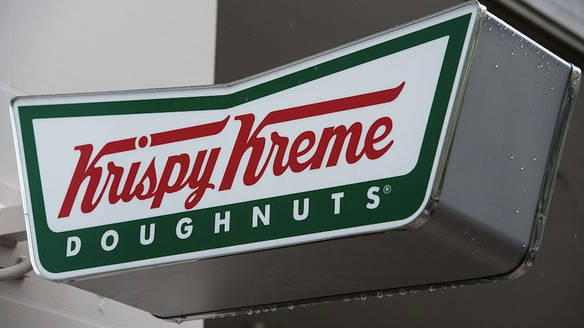 A Krispy Kreme doughnut shop sign is seen in Washington, DC, on May 9, 2016.