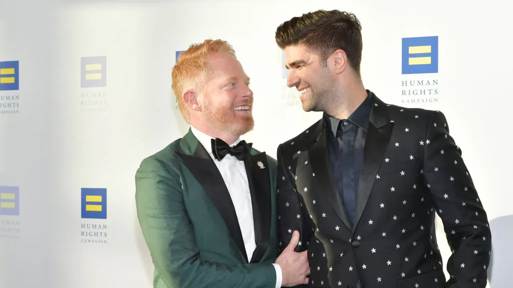 Actor Jokes He And Husband Are Raising Son ‘Gay Until He Decides He’s Straight,’ Sings To Him About Drag Queens