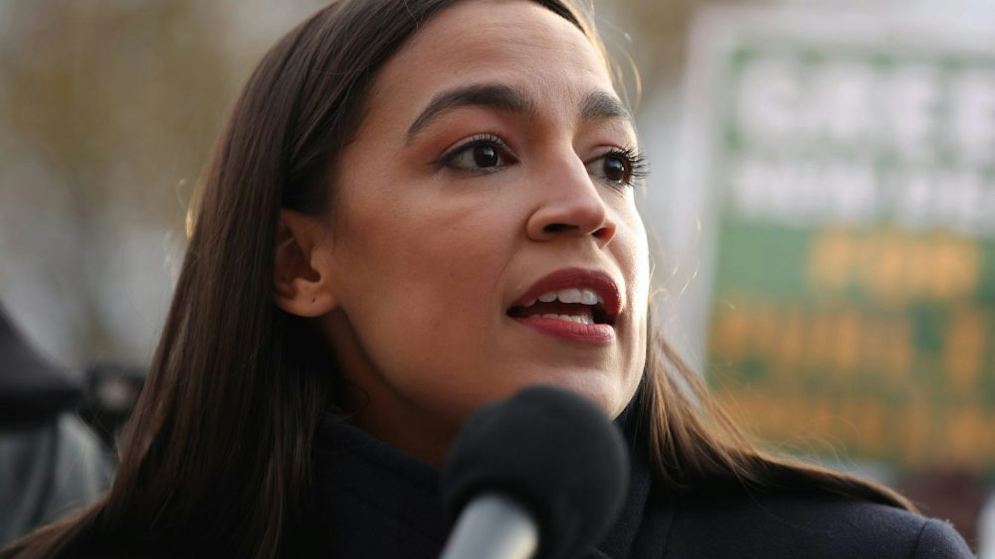 WASHINGTON, DC - NOVEMBER 14: Rep. Alexandria Ocasio-Cortez (D-NY) speaks during a news conference to introduce legislation to transform public housing as part of her Green New Deal outside the U.S. Capitol November 14, 2019 in Washington, DC. The liberal legislators invited affordable housing advocates and climate change activists to join them for the announcement.