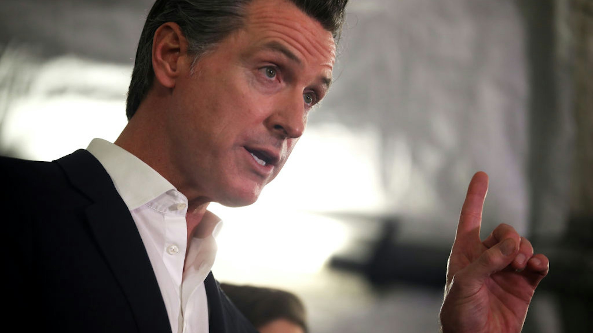 OAKLAND, CALIFORNIA - JANUARY 16: California Gov. Gavin Newsom speaks during a a news conference about the state's efforts on the homelessness crisis on January 16, 2020 in Oakland, California. Newsom was joined by Oakland Mayor Libby Schaaf to announce that Oakland will receive 15 unused FEMA trailers for the city to use as temporary housing and as mobile health and social services clinics for the homeless. Newsom signed on executive order on January 8 to deploy 100 trailers and crisis response teams to areas in need across the state.