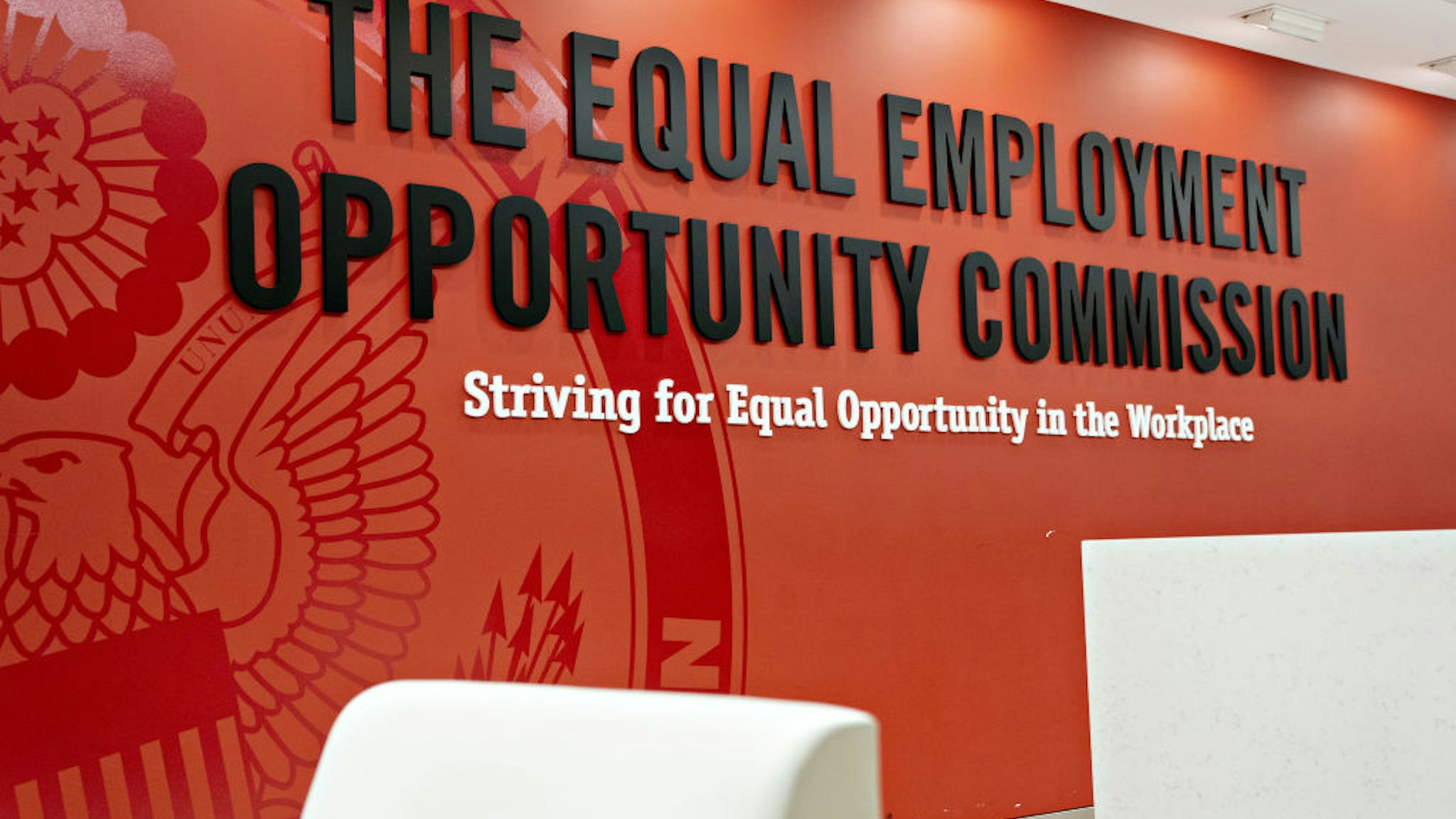 Signage is displayed inside the Equal Employment Opportunity Commission (EEOC) headquarters in Washington, D.C., U.S., on Tuesday, Feb. 18, 2020. The Trump administration wants to cut fiscal year 2021 spending on the Labor Department, National Labor Relations Board, and EEOC, reviving previous belt-tightening bids that have not been approved by Congress.
