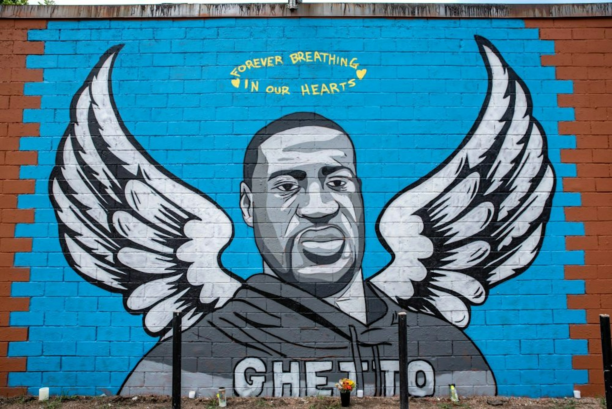 HOUSTON, TX - JUNE 02: A mural of George Floyd is shown painted on the side of Scott Food Mart in the Third Ward before a march in his honor on June 2, 2020 in Houston, Texas. Family members of Floyd were scheduled to participate in a march from Discovery Green to City Hall with support from the local chapter of Black Lives Matter. Floyd, a former resident of the Third Ward, died May 25 while in police custody in Minneapolis, Minnesota.