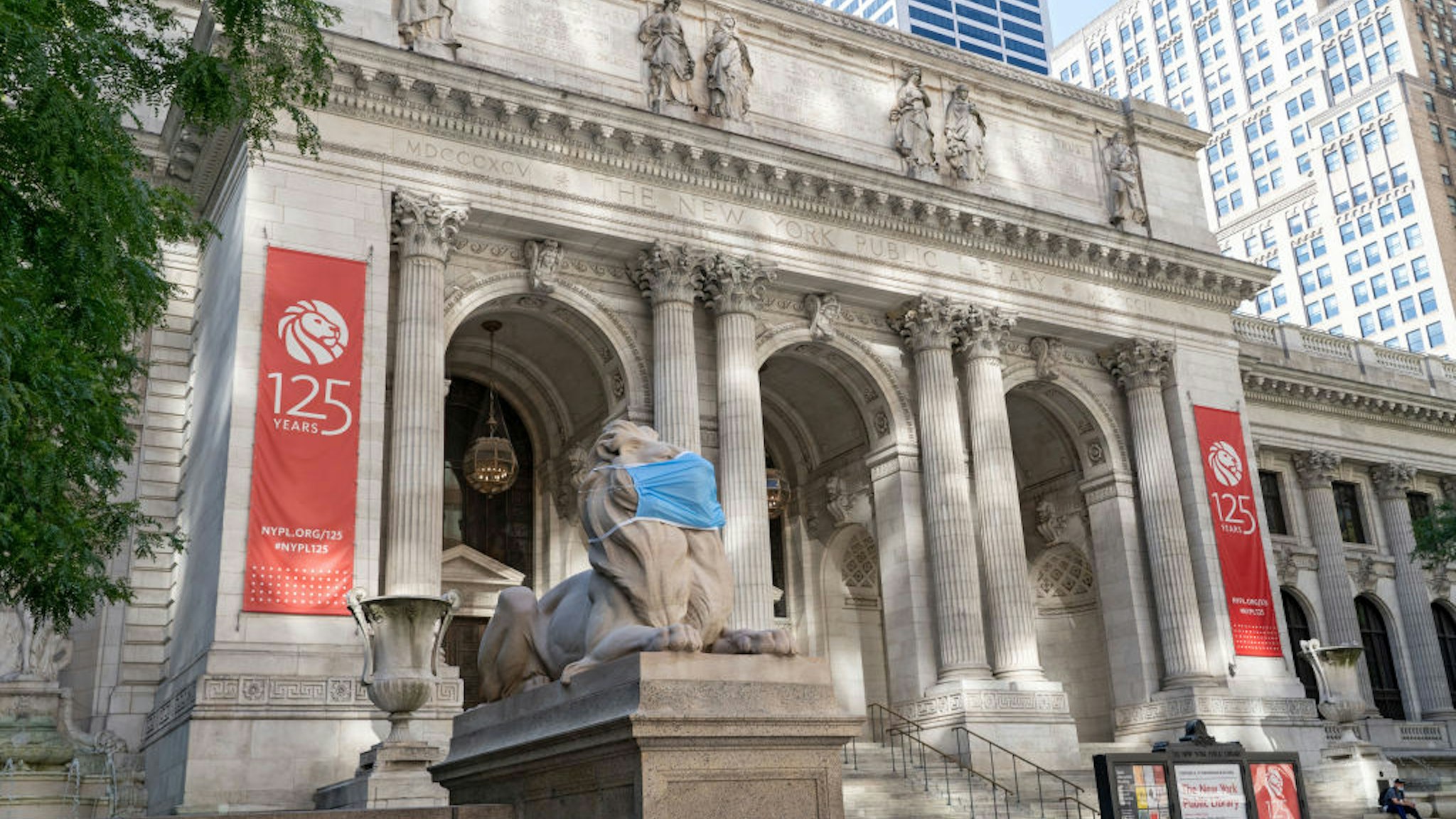 NEW YORK, UNITED STATES - 2020/07/13: An exterior view of New York Public Library on Fifth Ave in New York. The New York Public Library's stone lions Patience and Fortitude have donned face masks to remind New Yorkers to wear face coverings during the COVID-19 pandemic. (Photo by Ron Adar/SOPA Images/LightRocket via Getty Images)