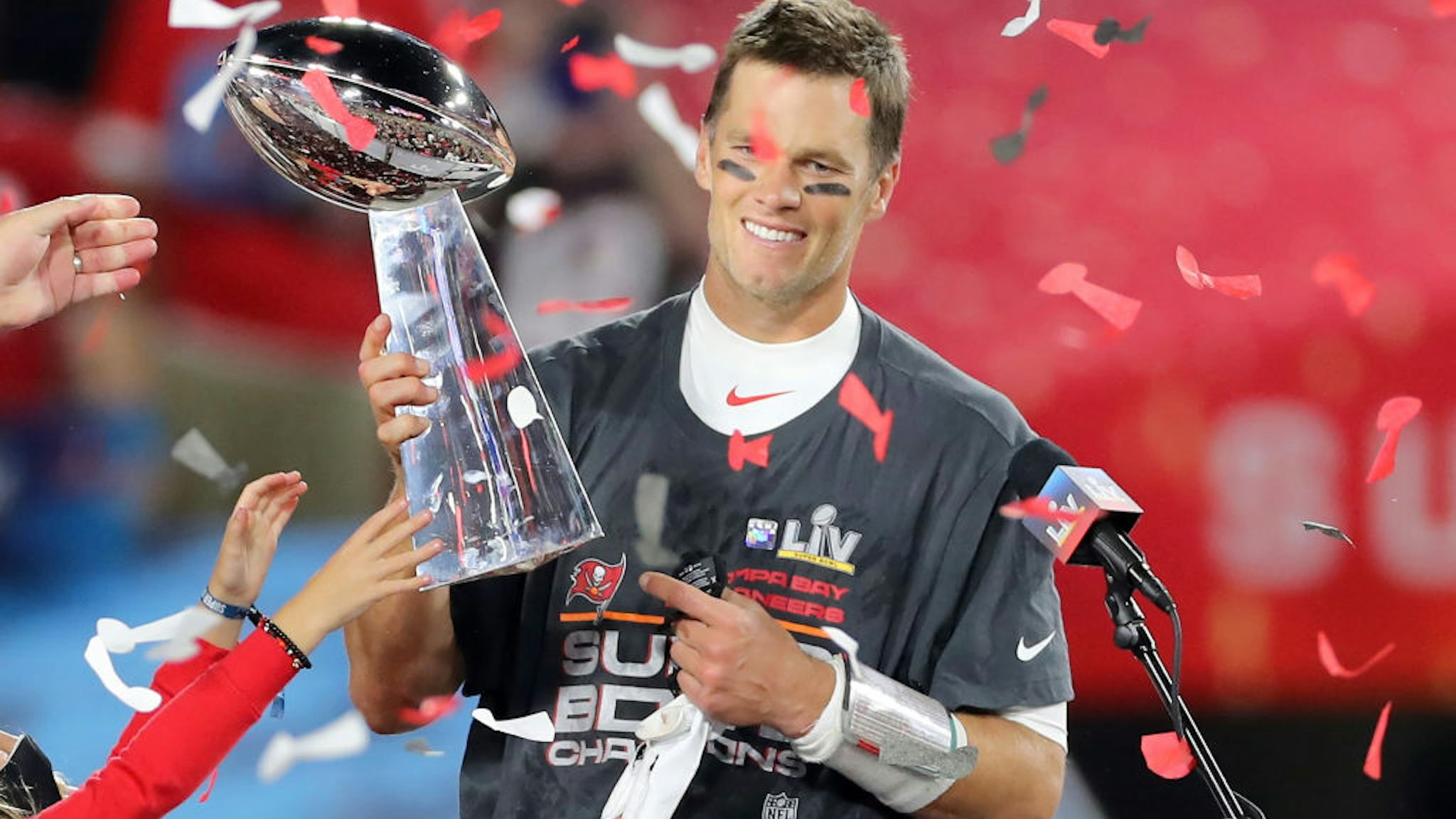 Super Bowl MVP Tom Brady (12) of the Buccaneers holds the Lombardi Trophy after the Super Bowl LV game between the Kansas City Chiefs and the Tampa Bay Buccaneers on February 7, 2021 at Raymond James Stadium, in Tampa, FL.