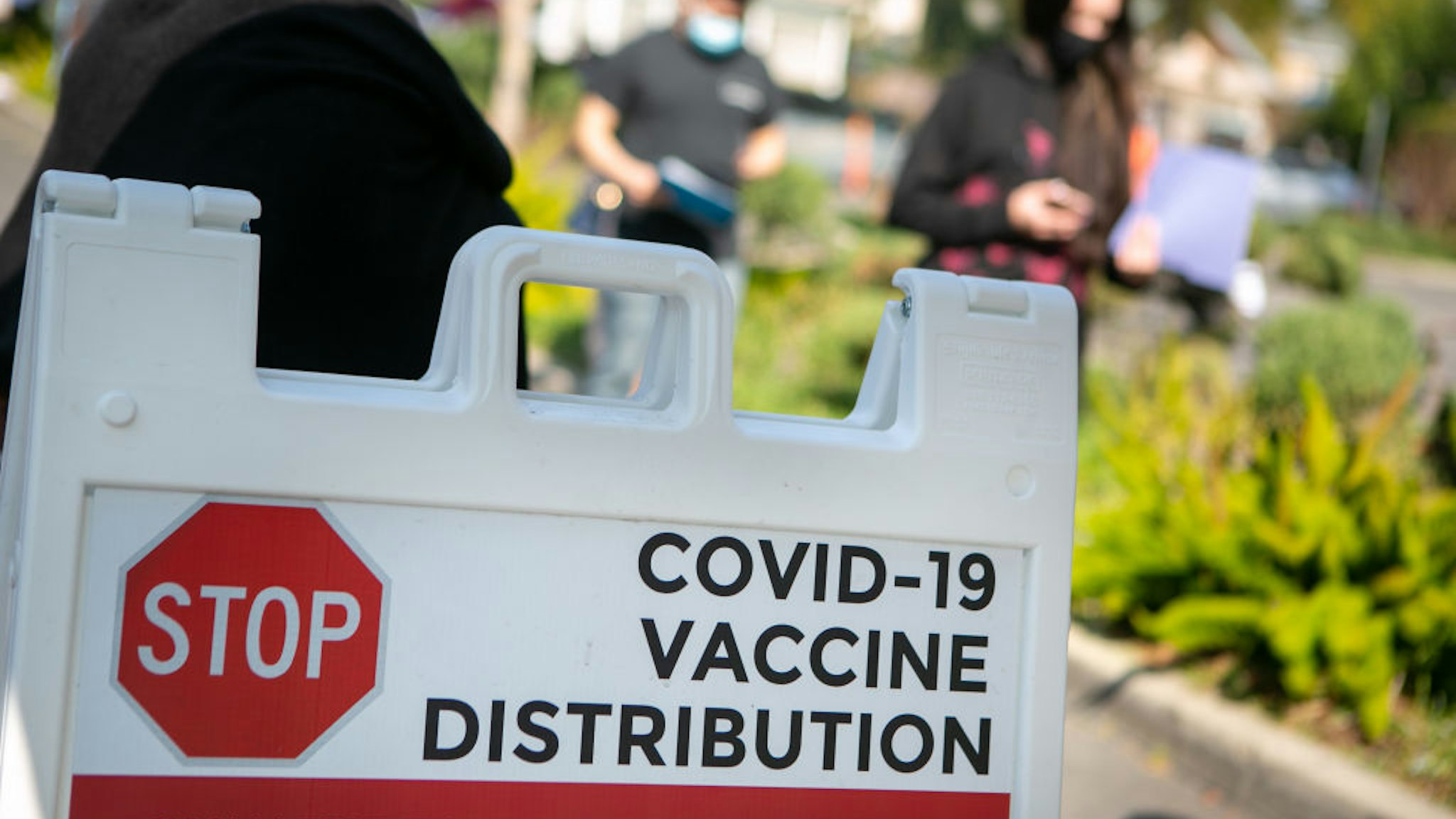 Hundreds of people line up for their turn at receiving the COVID-19 vaccine at Kedren Health on Thursday, Feb. 11, 2021 in Los Angeles, CA.