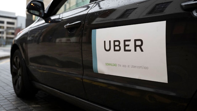 A close-up of an Uber sticker on the side of a car on February 19, 2021 in Cardiff, Wales.