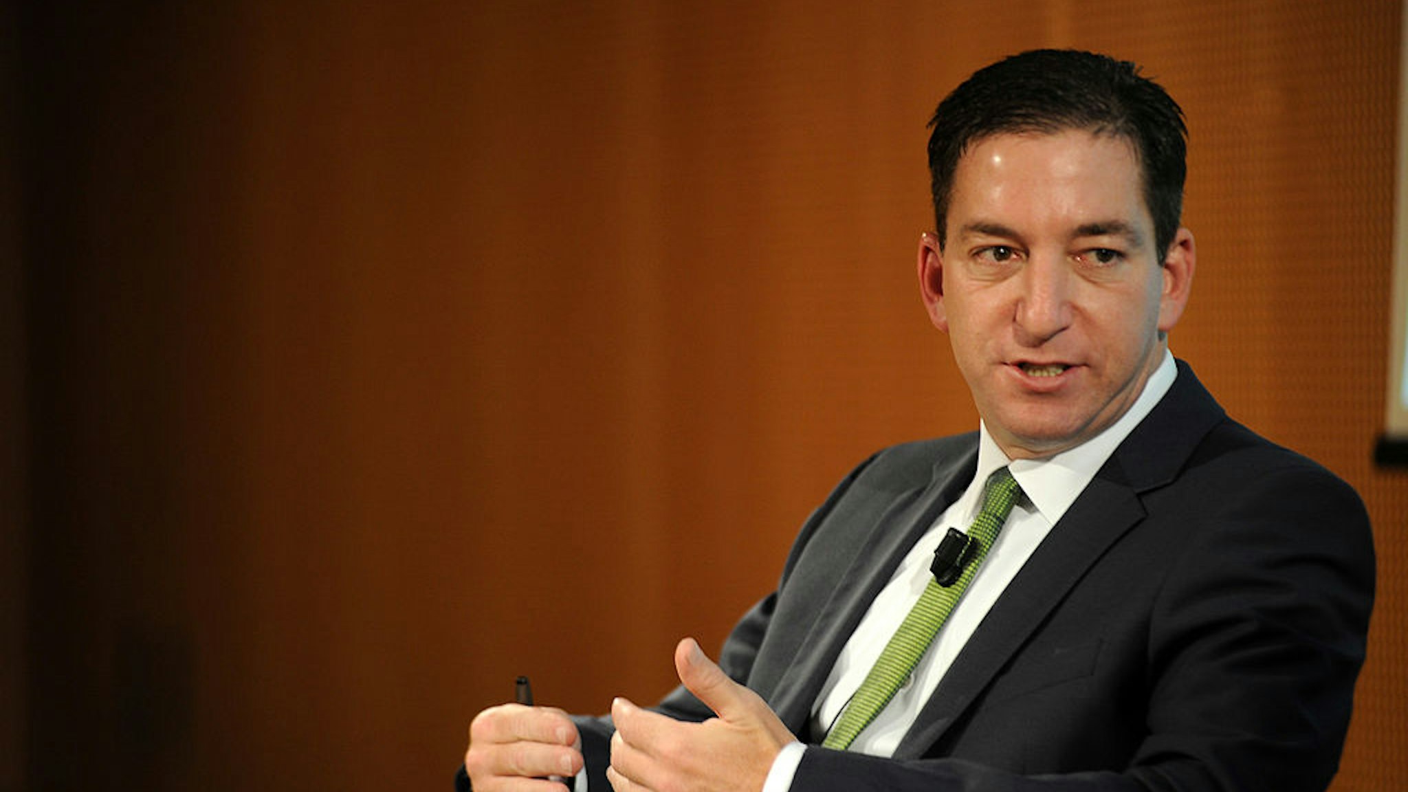 Glenn Greenwald speaks during the presentation of his book 'No Place to Hide: Edward Snowden, The NSA, And The U.S. Surveillance State' on May 26, 2014 in Milan, Italy.