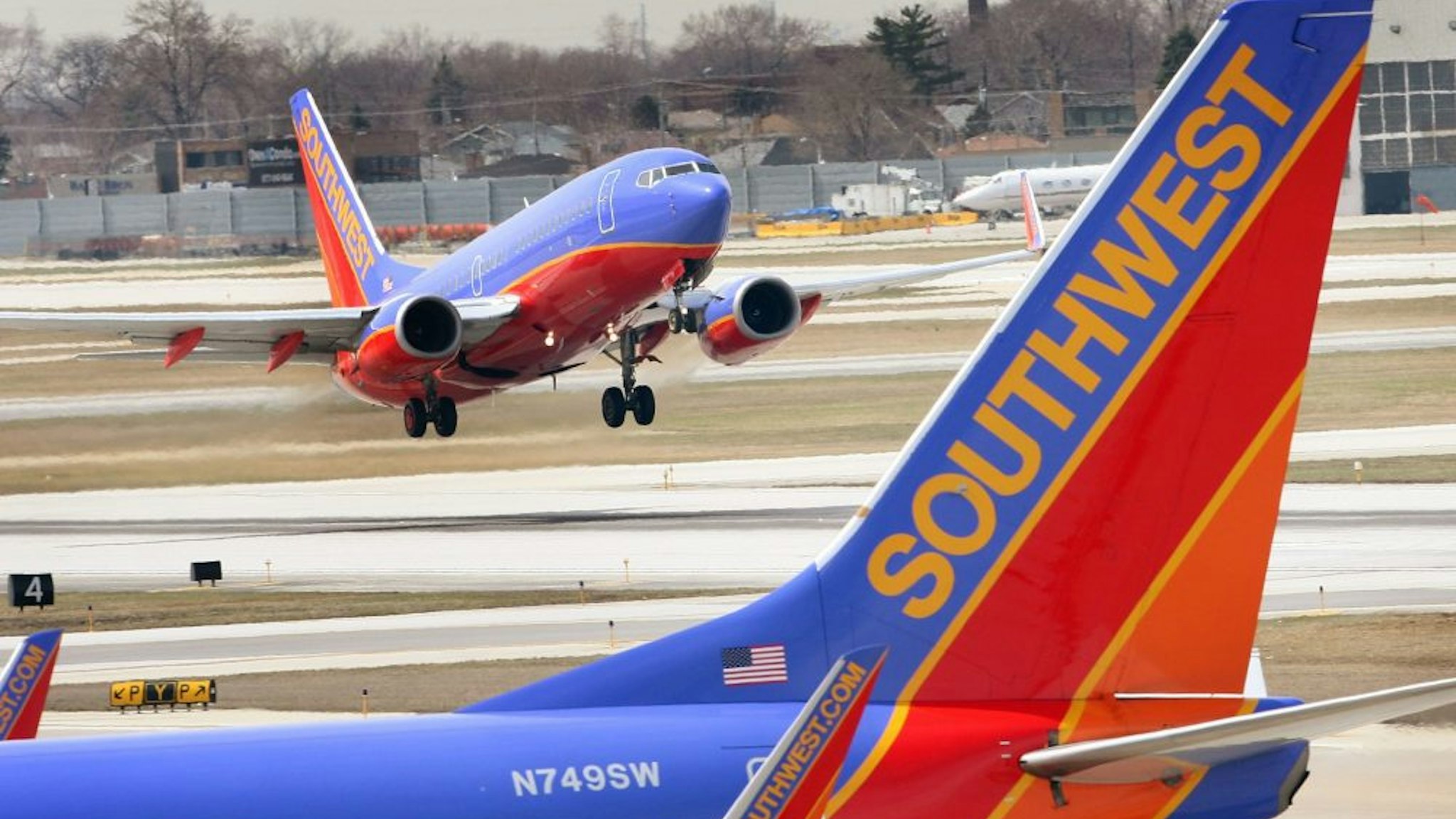 CHICAGO - APRIL 3: A Southwest Airlines jet takes off at Midway Airport April 3, 2008 in Chicago, Illinois. Officials from Southwest and other airlines will testify at a safety hearing on Capitol Hill today following recent cancellations of flights by Southwest, United, American and Delta airlines as jets were taken out of service for safety inspections.