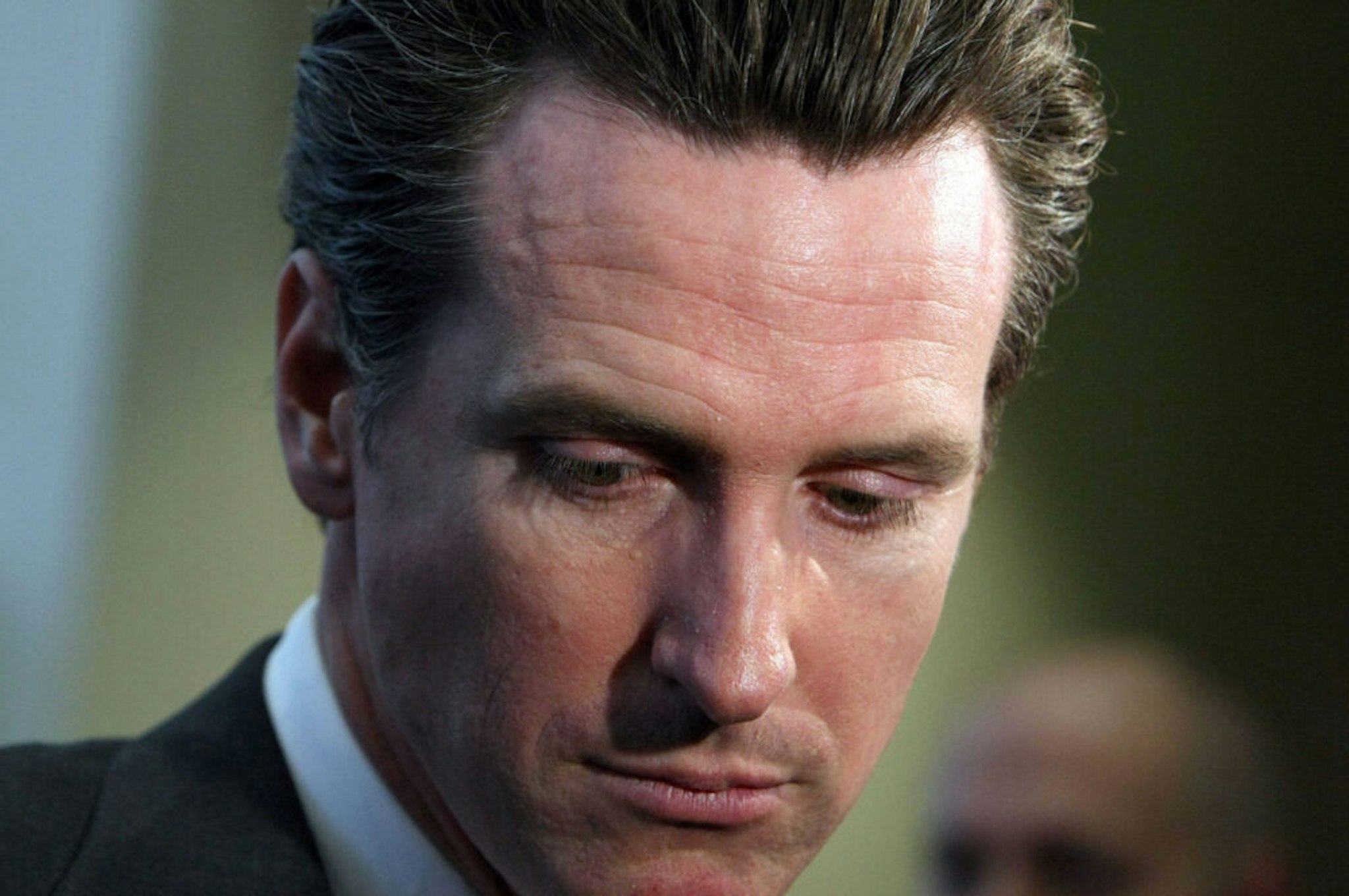 SAN FRANCISCO - OCTOBER 27: San Francisco mayor Gavin Newsom pauses while speaking at the grand opening of the new Charles Schwab office October 27, 2009 in San Francisco, California. After one year on the campaign trail, San Francisco mayor Gavin Newsom dropped out of the race for California governor on October 30, 2009.