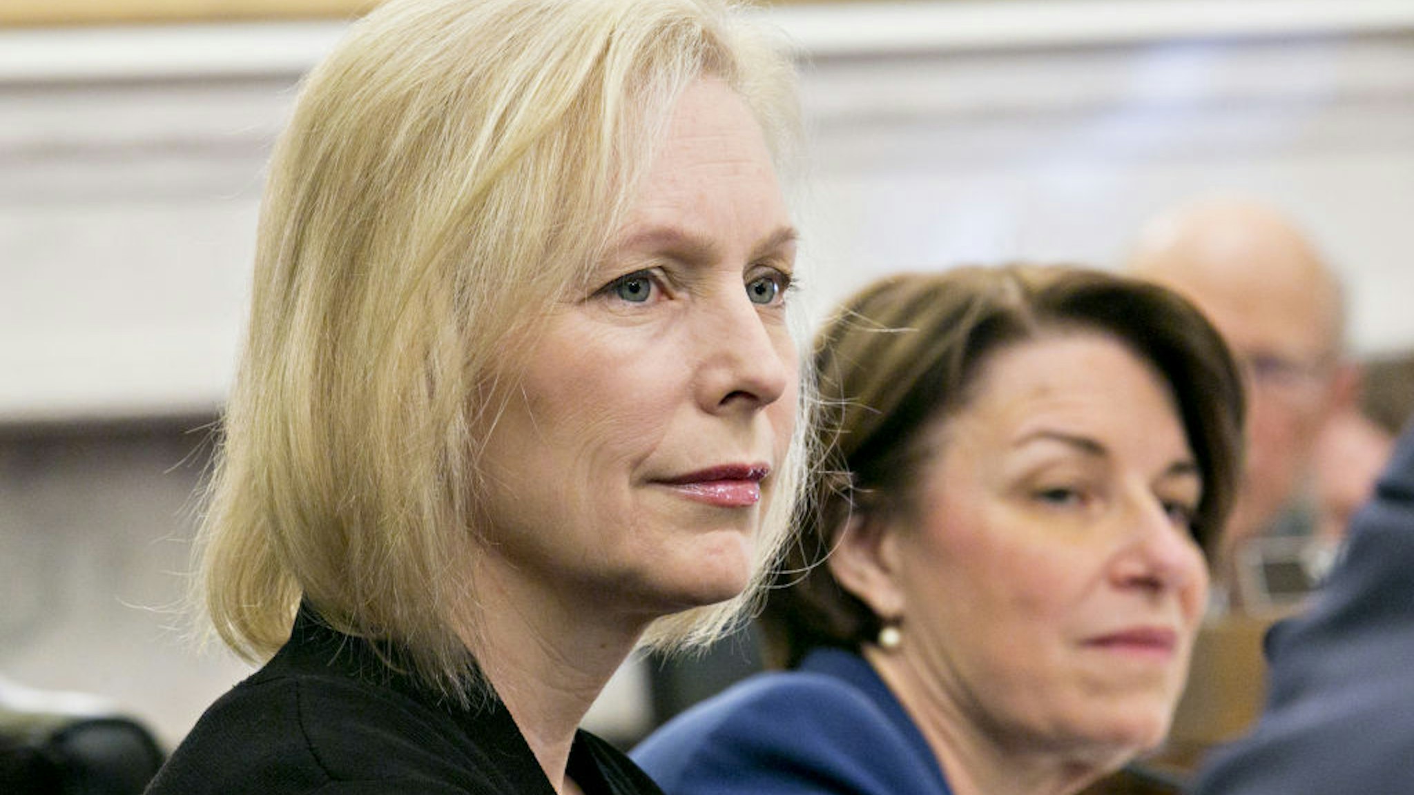 Senator Kristen Gillibrand, a Democrat from New York, left, listens during a Senate Agriculture, Nutrition and Forestry Committee hearing with Sonny Perdue, U.S. secretary of agriculture, not pictured, in Washington, D.C., U.S., on Thursday, Feb. 28, 2019. Perdue told lawmakers in a House hearing yesterday that a final rule to allow widespread sales of those higher blends wont happen by the summer-driving season following delays from the 35-day partial government shutdown. Photographer: Andrew Harrer/Bloomberg