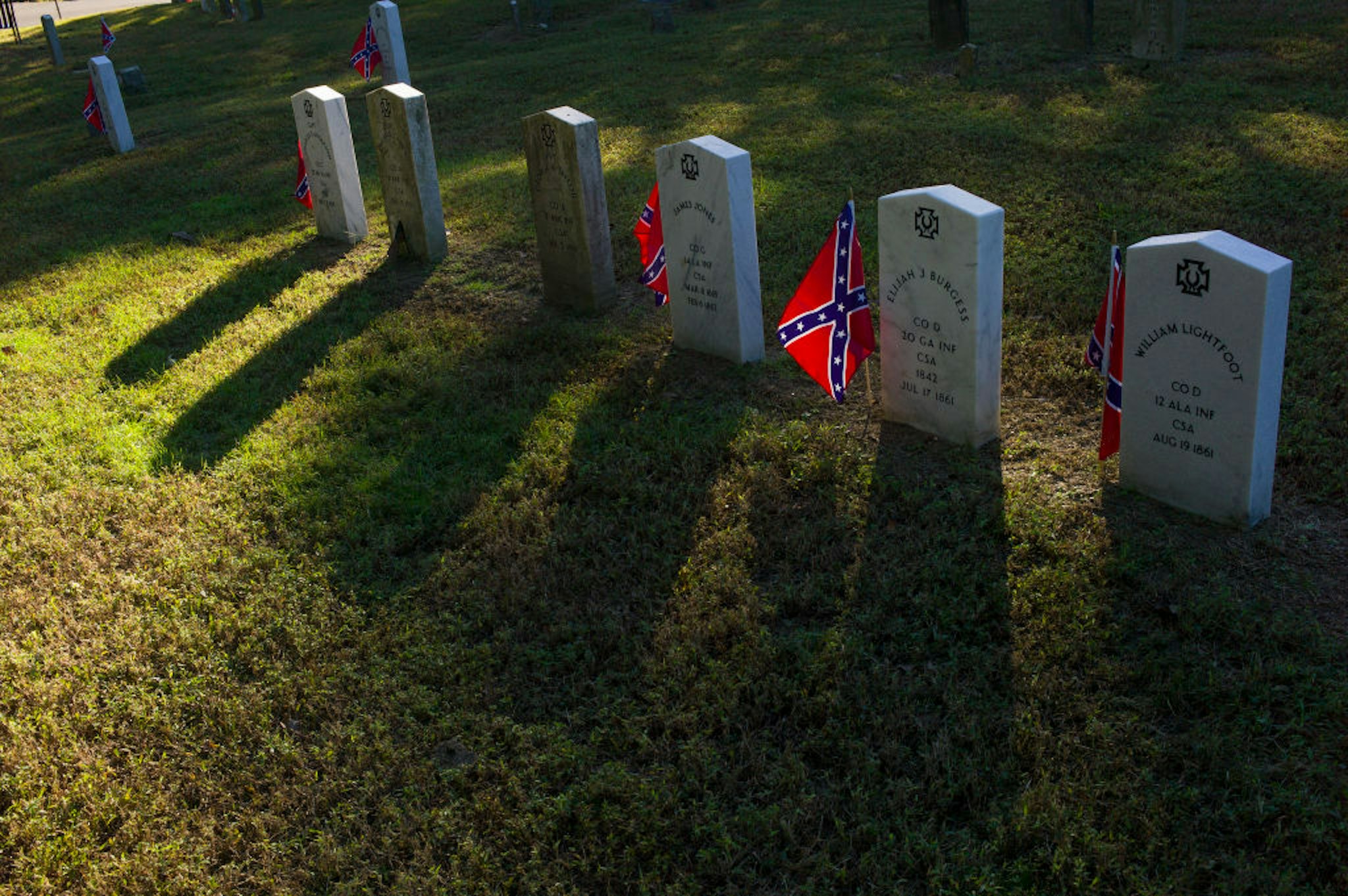 RICHMOND, VA - OCTOBER 18: Confederate flags decorate the graves of Confederate soldiers killed during the Civil War on October 18, 2018 in the historical Hollywood Cemetery in Richmond, Virginia.
