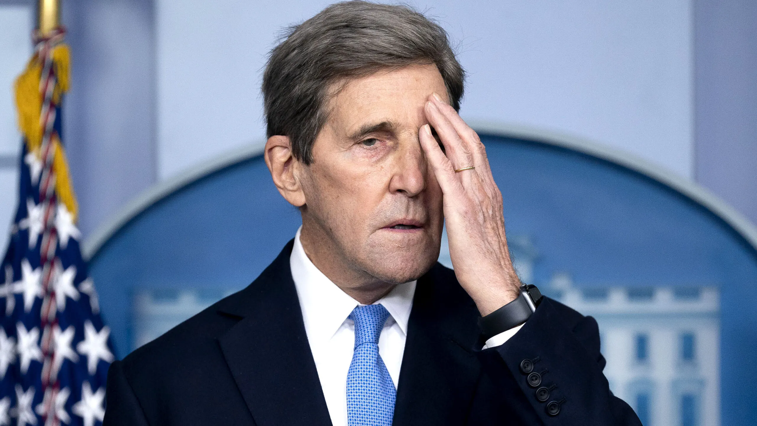 Kerry Caught Not Wearing Mask On Flight. He Claims It Was Only A Moment; Witness Claims That’s Not True.