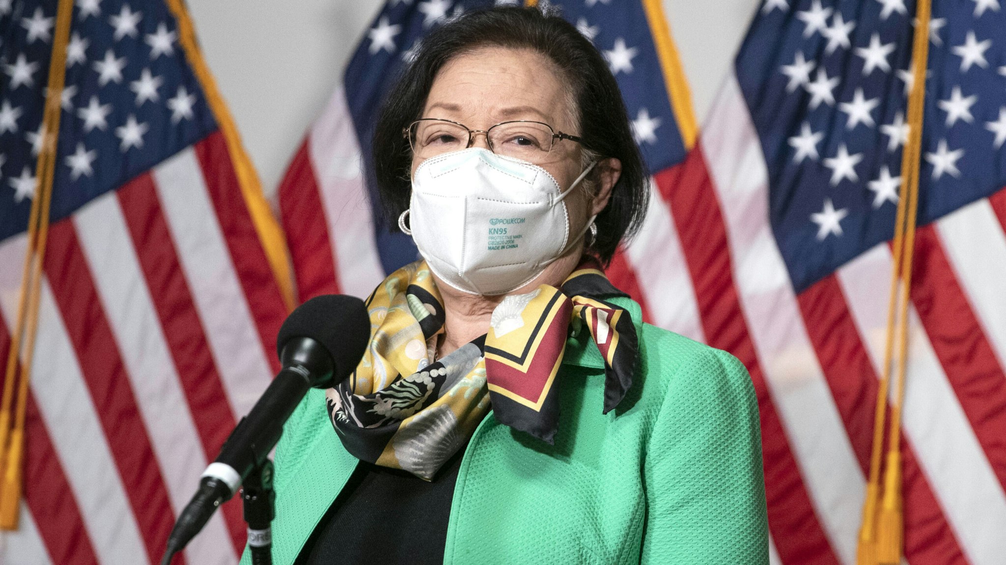Senator Mazie Hirono, a Democrat from Hawaii, wears a protective mas while speaking to members of the media outside a Senate Judiciary Committee confirmation hearing for Merrick Garland, U.S. attorney general nominee for U.S. President Joe Biden, in Washington, D.C., U.S., on Monday, Feb. 22, 2021. Garland signaled he'll make decisions independently from Biden and is pledging he'll take the lead in prosecuting participants in the mob that attacked the Capitol on Jan. 6.