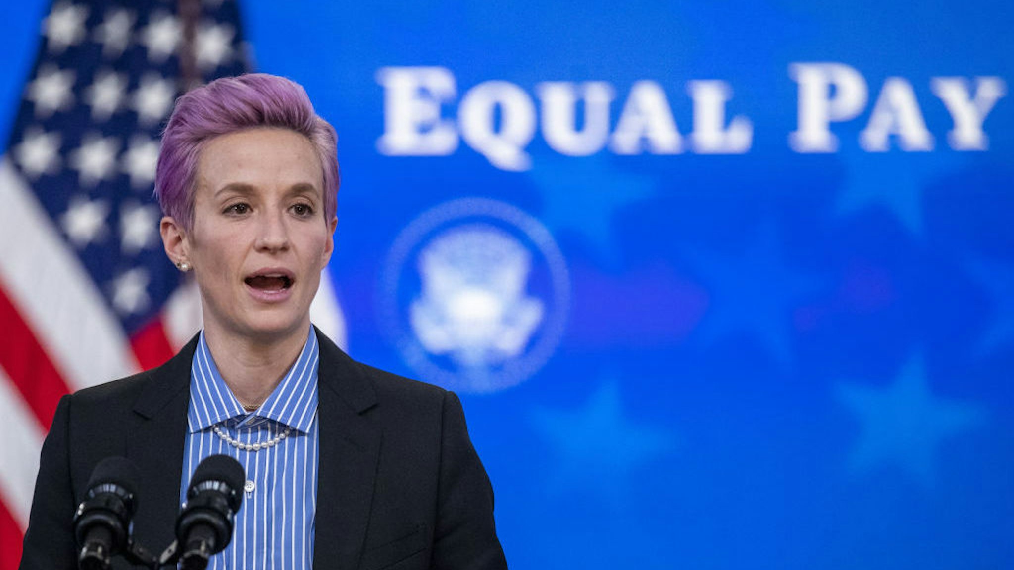 Megan Rapinoe, player with the U.S. Women's National Soccer Team, speaks during an event marking Equal Pay Day in the Eisenhower Executive Office Building in Washington, D.C., U.S., on Wednesday, March 24, 2021. The Biden administration has signaled plans to strengthen gender equity at a time when women in the U.S. are disproportionately exiting the workforce compared with men during the Covid-19 pandemic, and are paid about 82 cents on the dollar compared with men. Photographer: Shawn Thew/EPA/Bloomberg