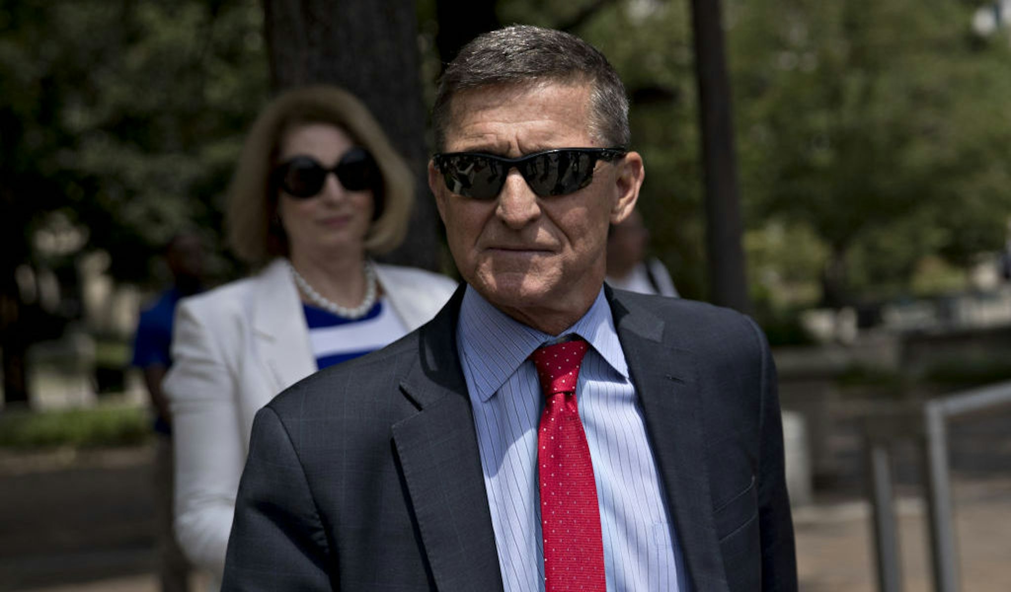 Michael Flynn, former U.S. national security adviser, exits federal court in Washington, D.C., U.S., on Monday, June 24, 2019. Flynn may have a singular goal in replacing his longtime criminal defense attorneys this month with the politically provocative Sidney Powell, to win a pardon from his old boss, President Donald Trump. Photographer: Andrew Harrer/Bloomberg