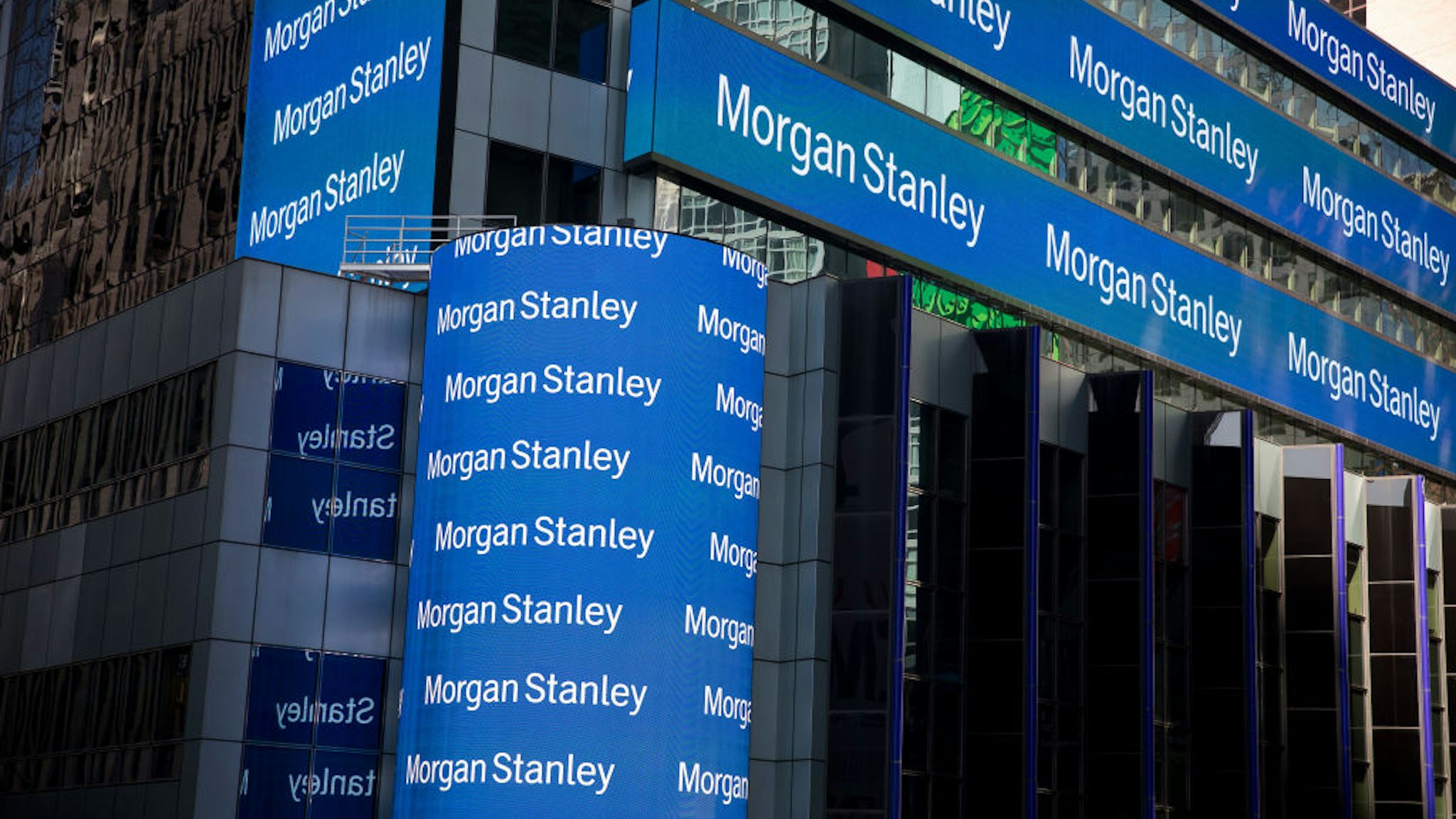 Monitors display signage outside of Morgan Stanley global headquarters in New York, U.S., on Monday, Oct. 14, 2019. Morgan Stanley is scheduled to release earnings figures on October 17.