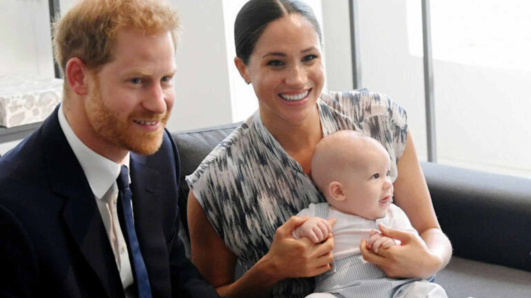 Britain's Prince Harry and his wife Meghan, Duchess of Sussex, holding their son Archie, meet Archbishop Desmond Tutu at the Desmond &amp; Leah Tutu Legacy Foundation in Cape Town, South Africa, September 25, 2019. REUTERS/Toby Melville/Pool