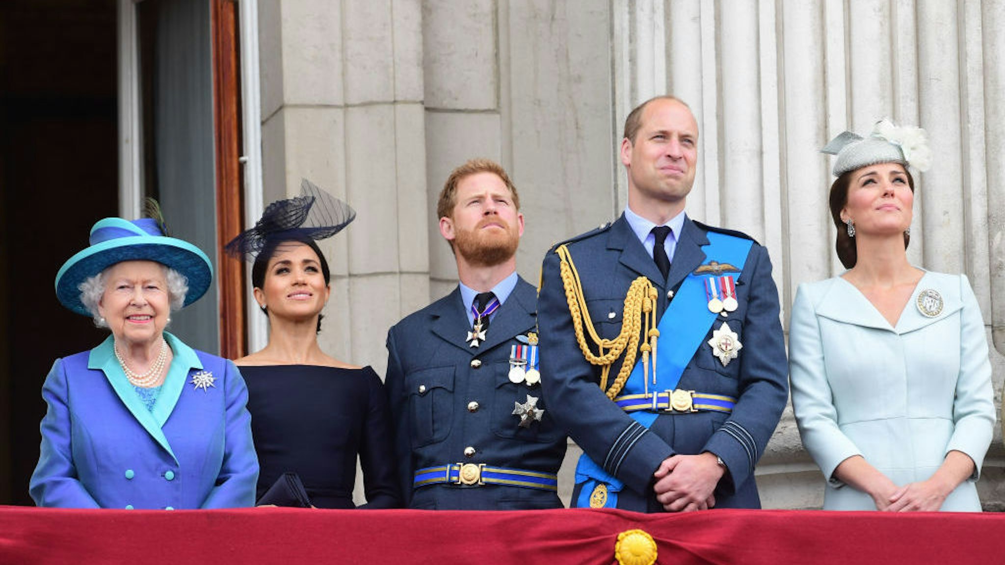 From left, Queen Elizabeth II, Meghan Duchess of Sussex, Prince Harry Duke of Sussex, Prince William Duke of Cambridge and Katherine Duchess of Cambridge watch the RAF 100th anniversary flypast from the balcony of Buckingham Palace, London, Tuesday 10th July, 2018. Photo: Paul Grover for the Telegraph