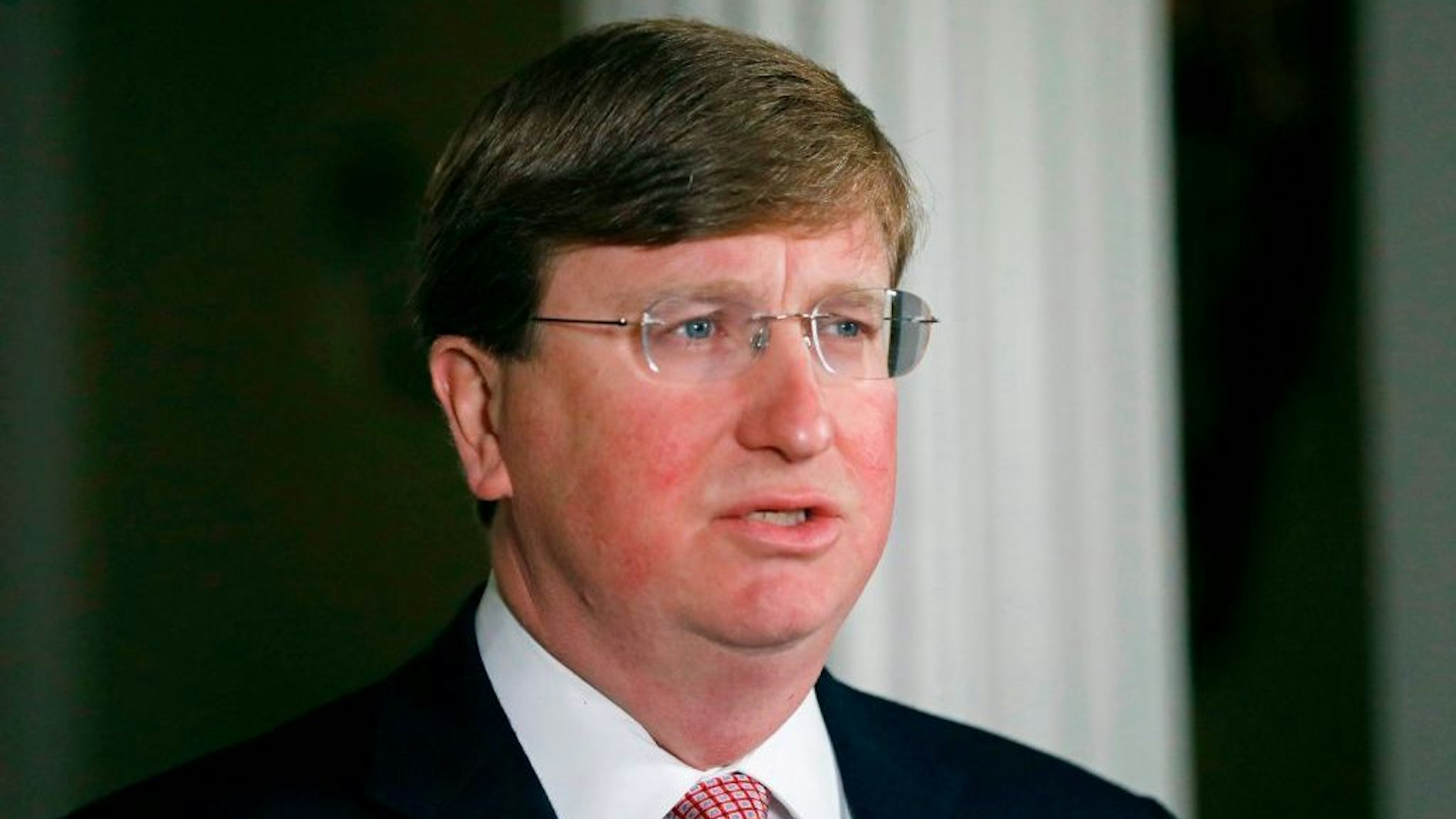 Mississippi Republican Gov. Tate Reeves delivers a televised address prior to signing a bill retiring the last state flag with the Confederate battle emblem during a ceremony at the Governor's Mansion in Jackson, Mississippi, on June 30, 2020. (Photo by ROGELIO V. SOLIS/POOL/AFP via Getty Images)