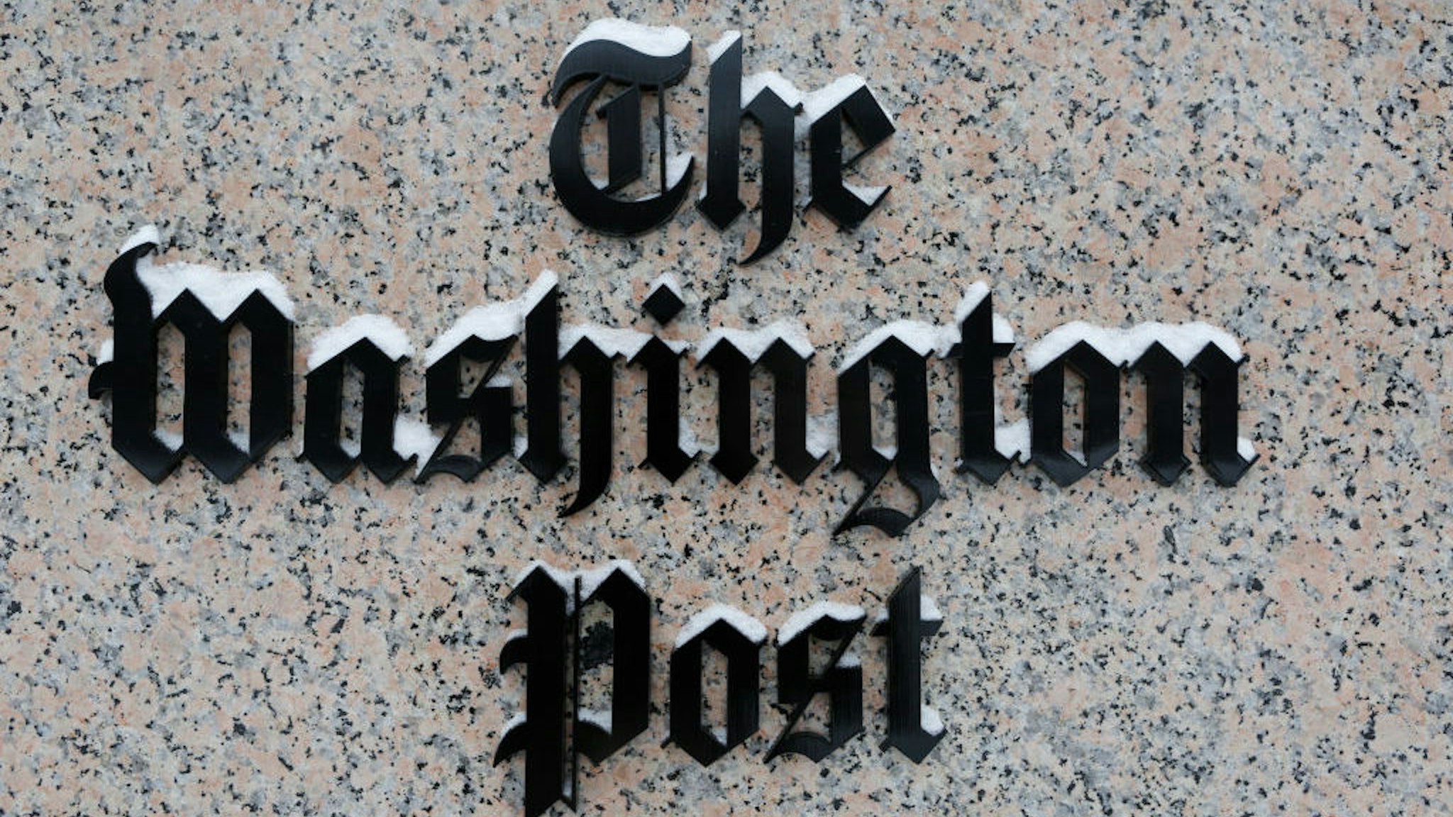 WASHINGTON, DC - JANUARY 23: Washington Post logo outside of the building covered with snow. (Photo by Oliver Contreras/For The Washington Post via Getty Images)