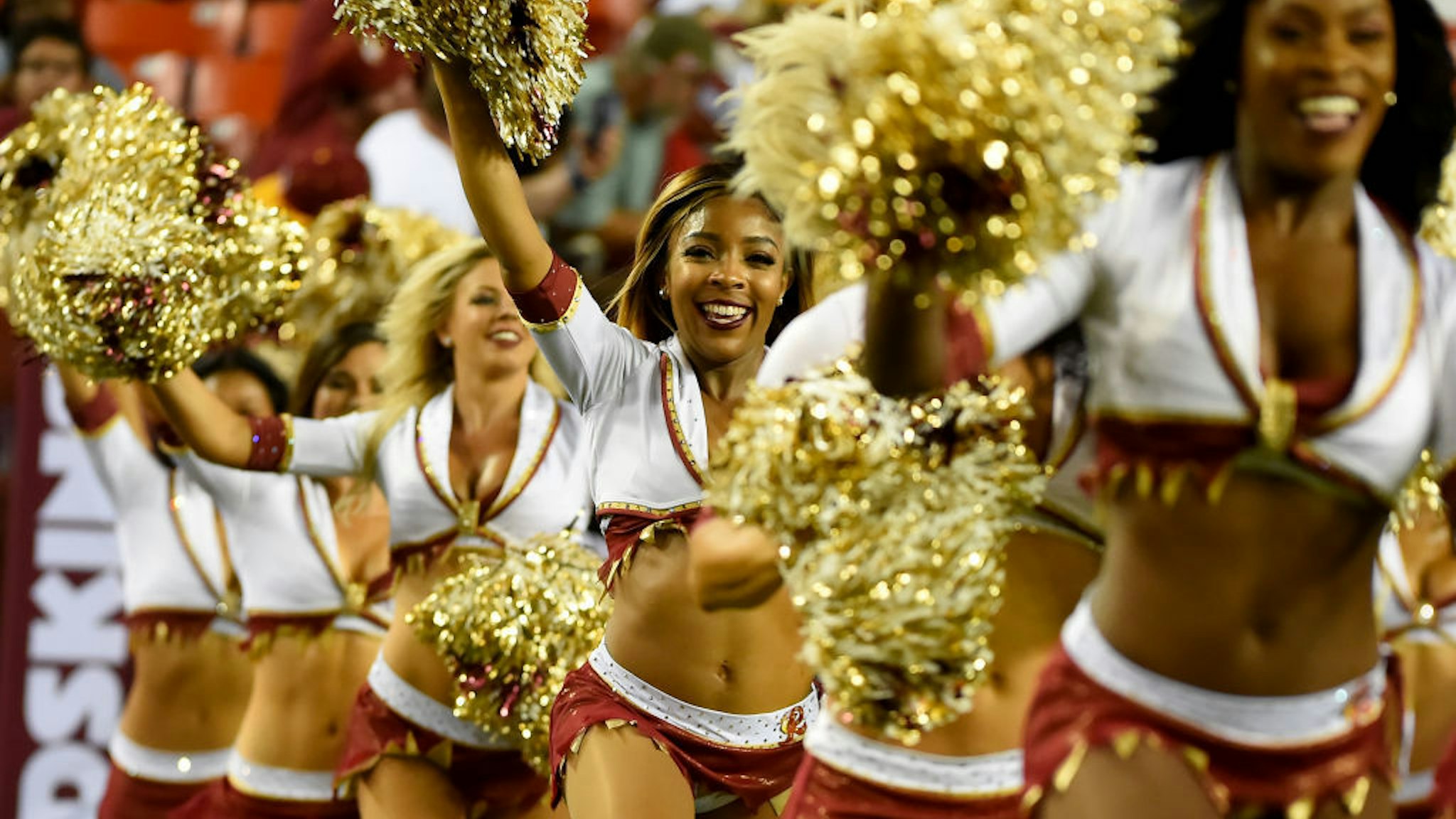 Washington Redskins cheerleaders run on to the field prior to the game against the Chicago Bears at FedExField on September 23, 2019 in Landover, Maryland. (Photo by Will Newton/Getty Images)